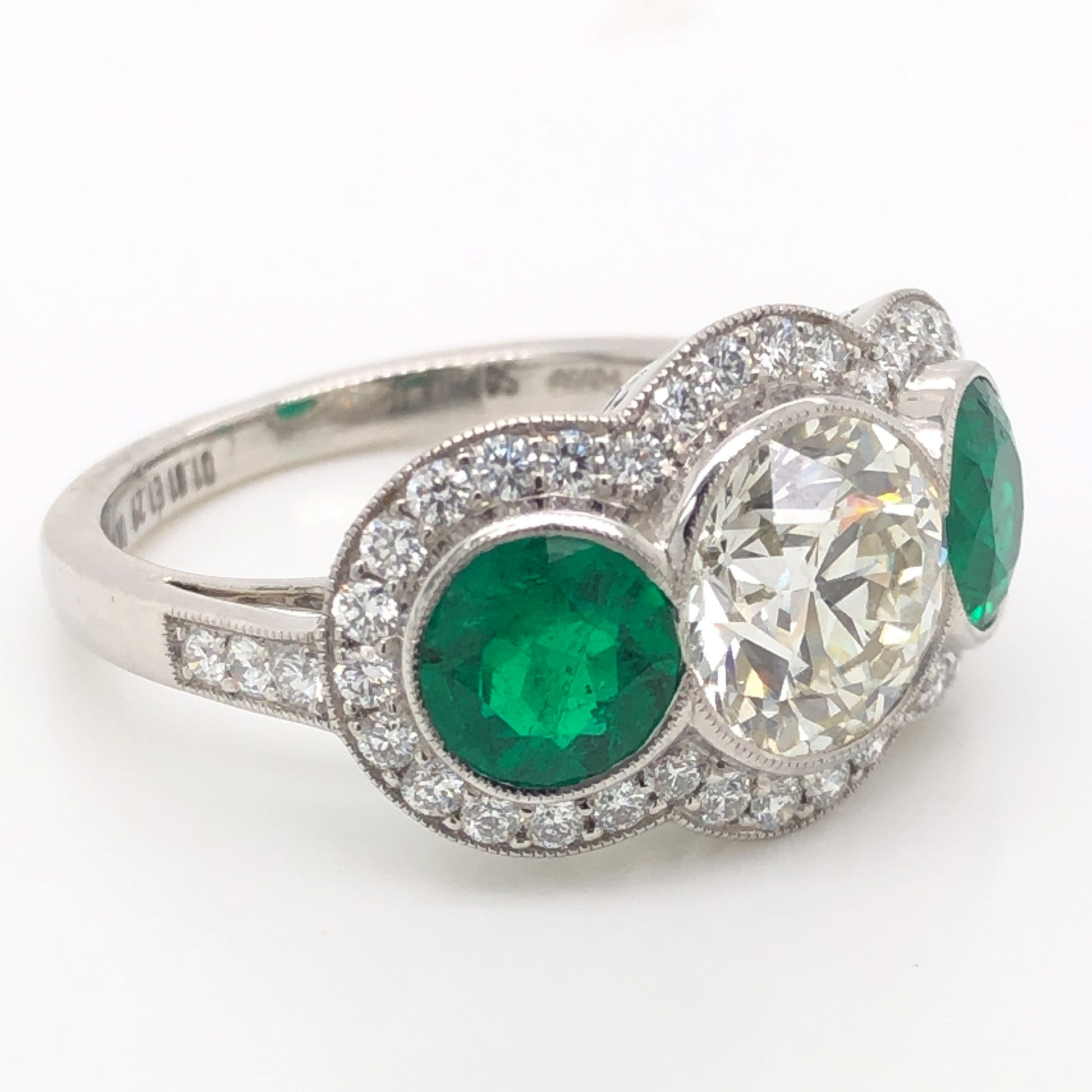 1.81 Diamond & Emerald Three Stone Ring in Platinum