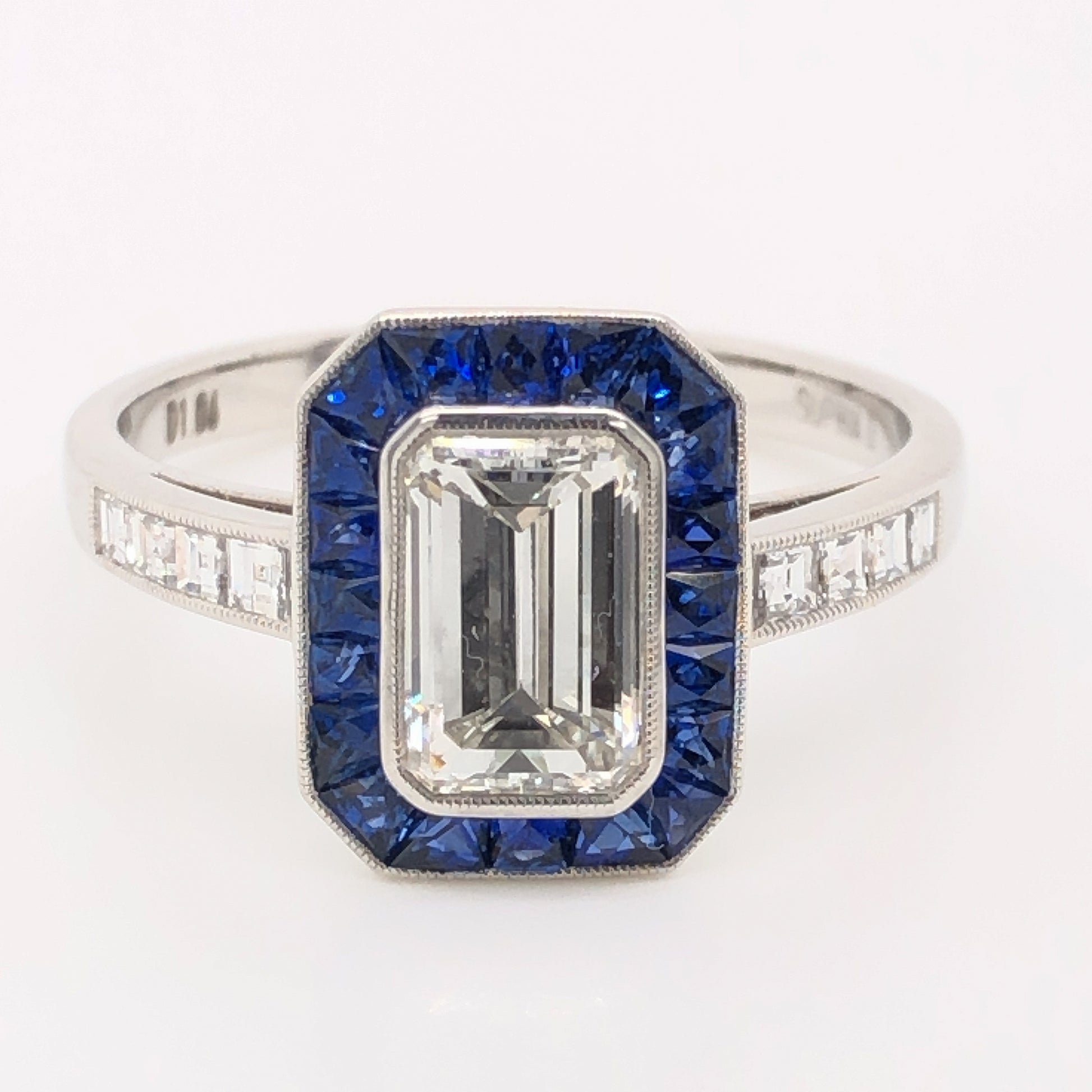 1.06 Emerald Cut Diamond & Sapphire Ring in Platinum