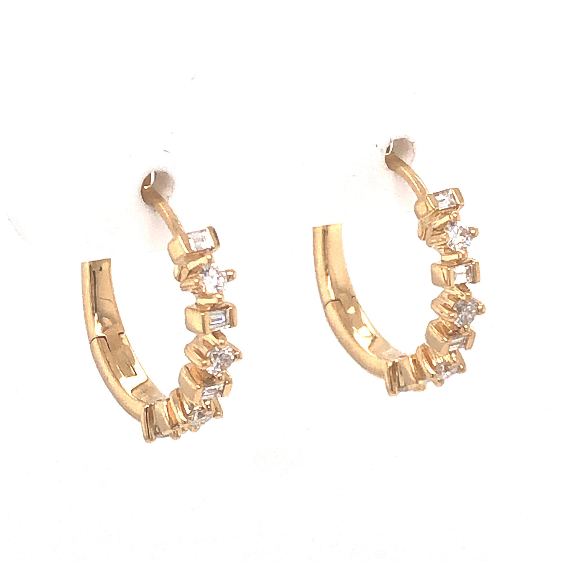 .34 Carat Diamond Hoop Earrings in 18K Yellow GoldComposition: 18 Karat Yellow GoldTotal Diamond Weight: .34 ctTotal Gram Weight: 3.6 gInscription: 18k 750