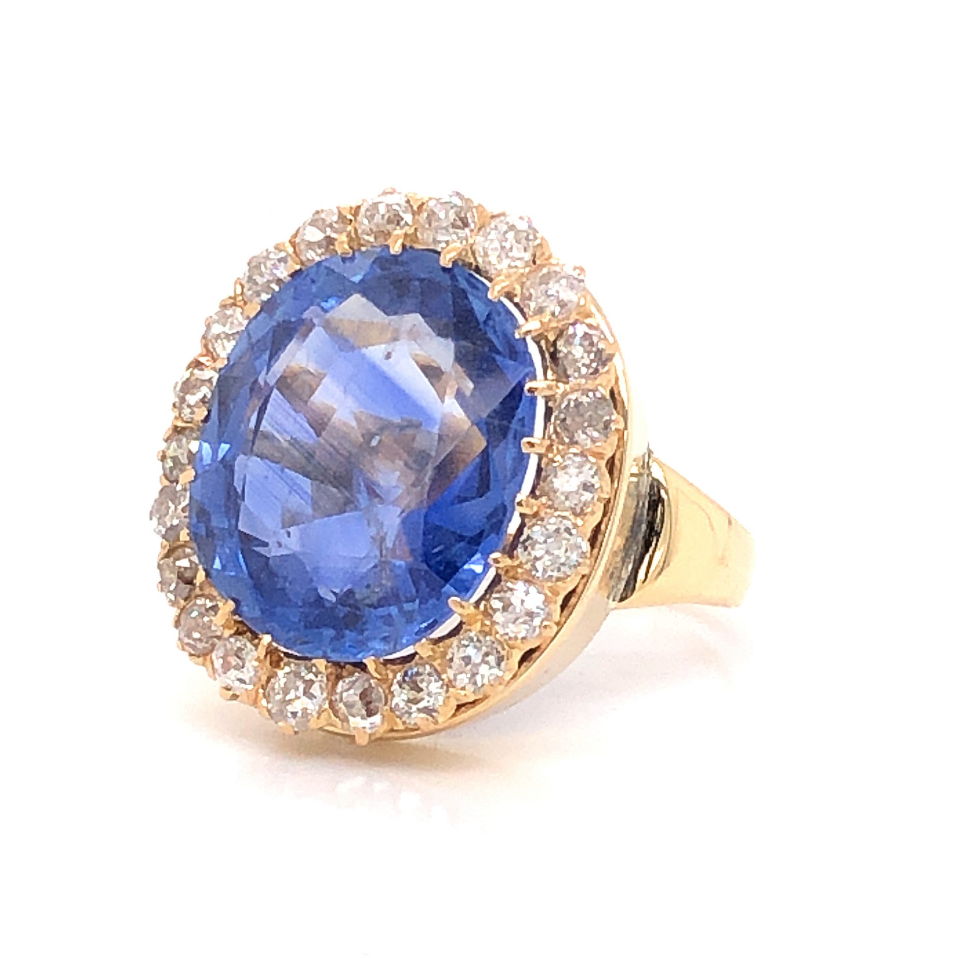 9.62 Victorian Blue Spinel & Diamond Cocktail Ring in 14kComposition: PlatinumRing Size: 6.5Total Diamond Weight: 1.54 ctTotal Gram Weight: 7.4 g