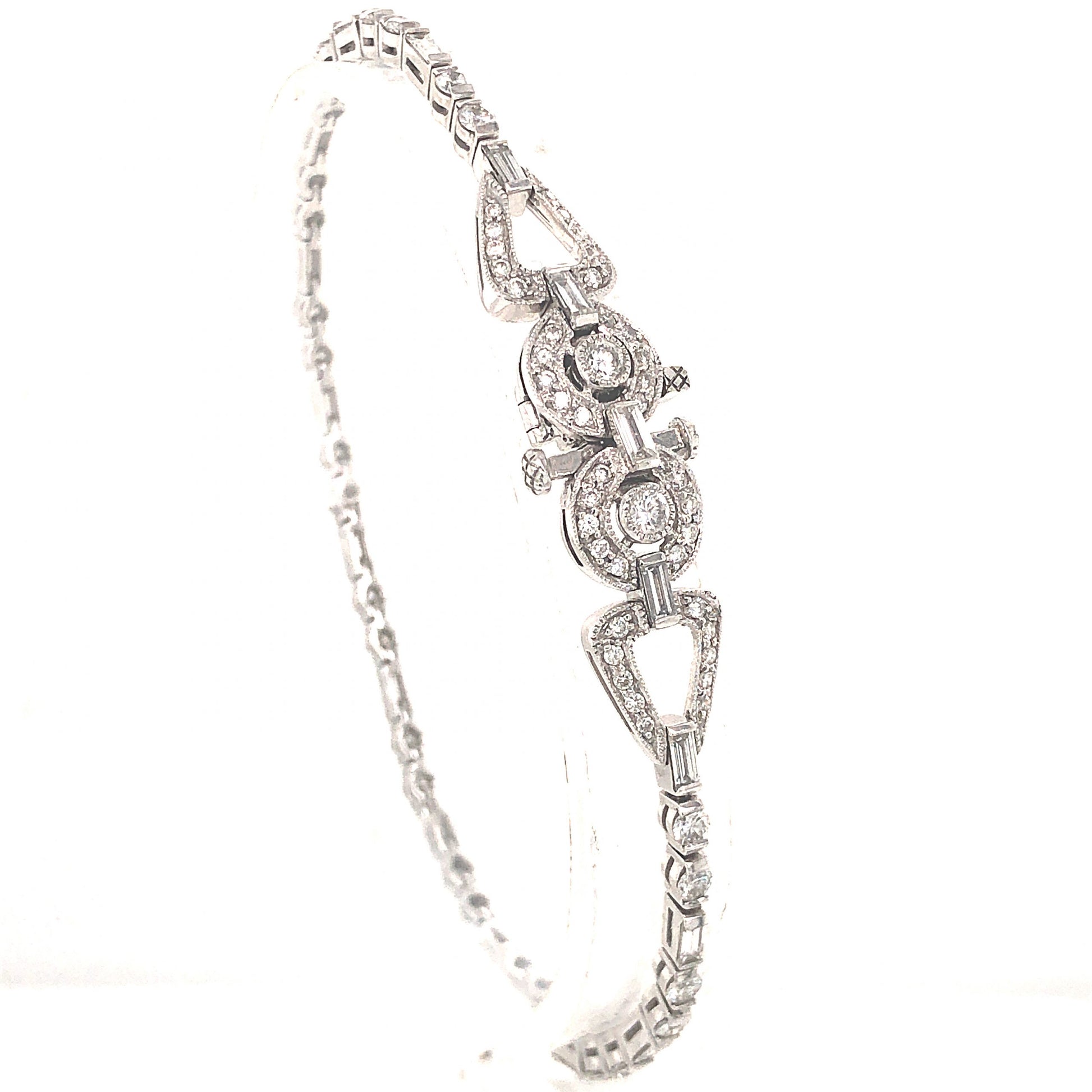 3.15 Antique Inspired Diamond Bracelet in PlatinumComposition: PlatinumTotal Diamond Weight: 3.15 ctTotal Gram Weight: 14.2 gInscription: Plat Sophia D.
