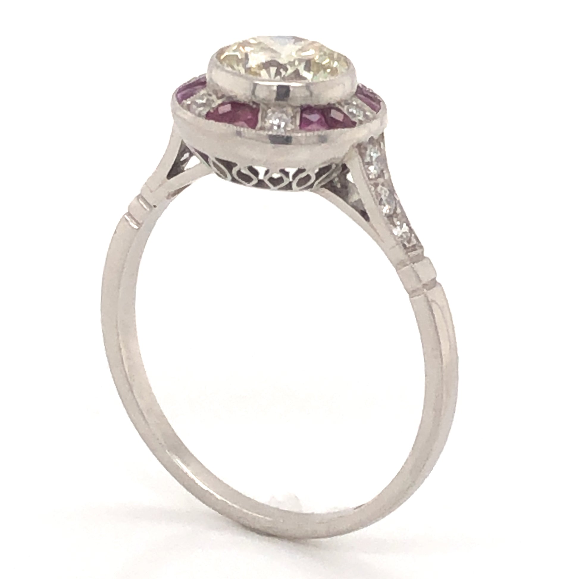 1.12 Fancy Light Yellow Diamond & Ruby Ring in Platinum