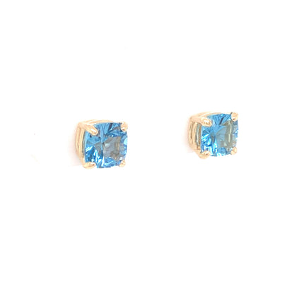 Blue Topaz Stud Earrings in 14k Yellow Gold