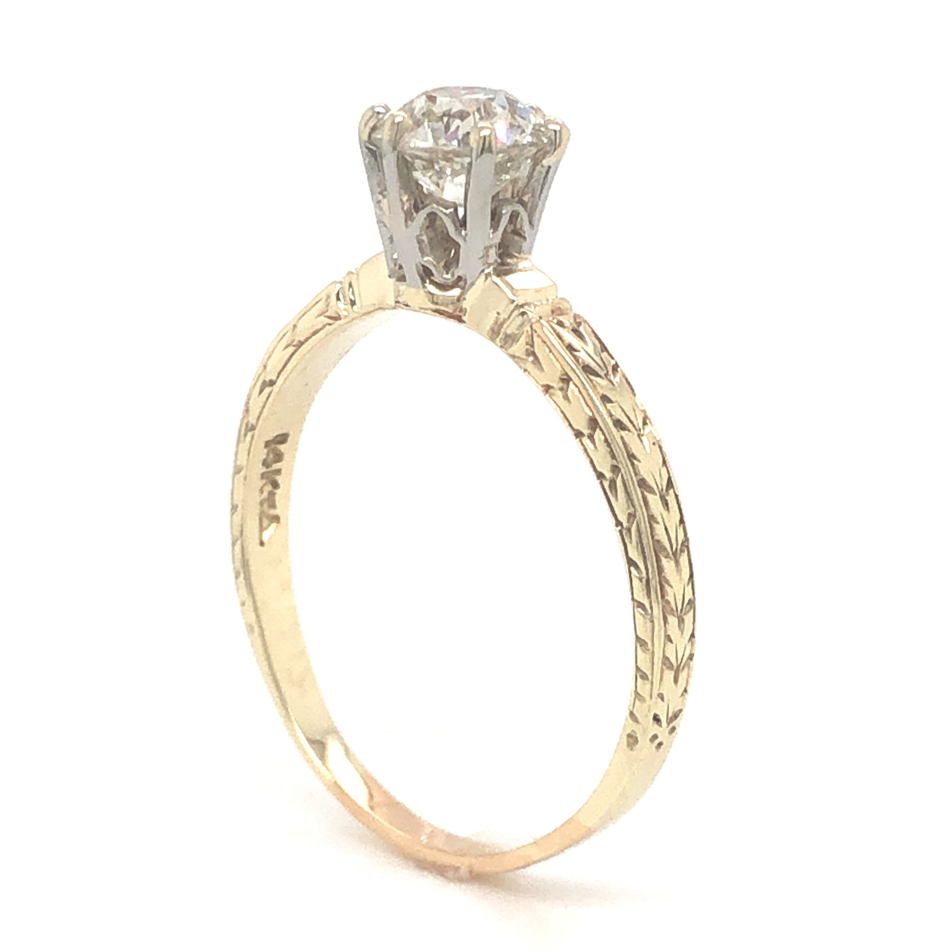 .77 Art Deco Solitaire Diamond Engagement Ring in 14k Yellow GoldComposition: Platinum Ring Size: 6.25 Total Diamond Weight: .77ct Total Gram Weight: 2.08 g Inscription: 14k
      
