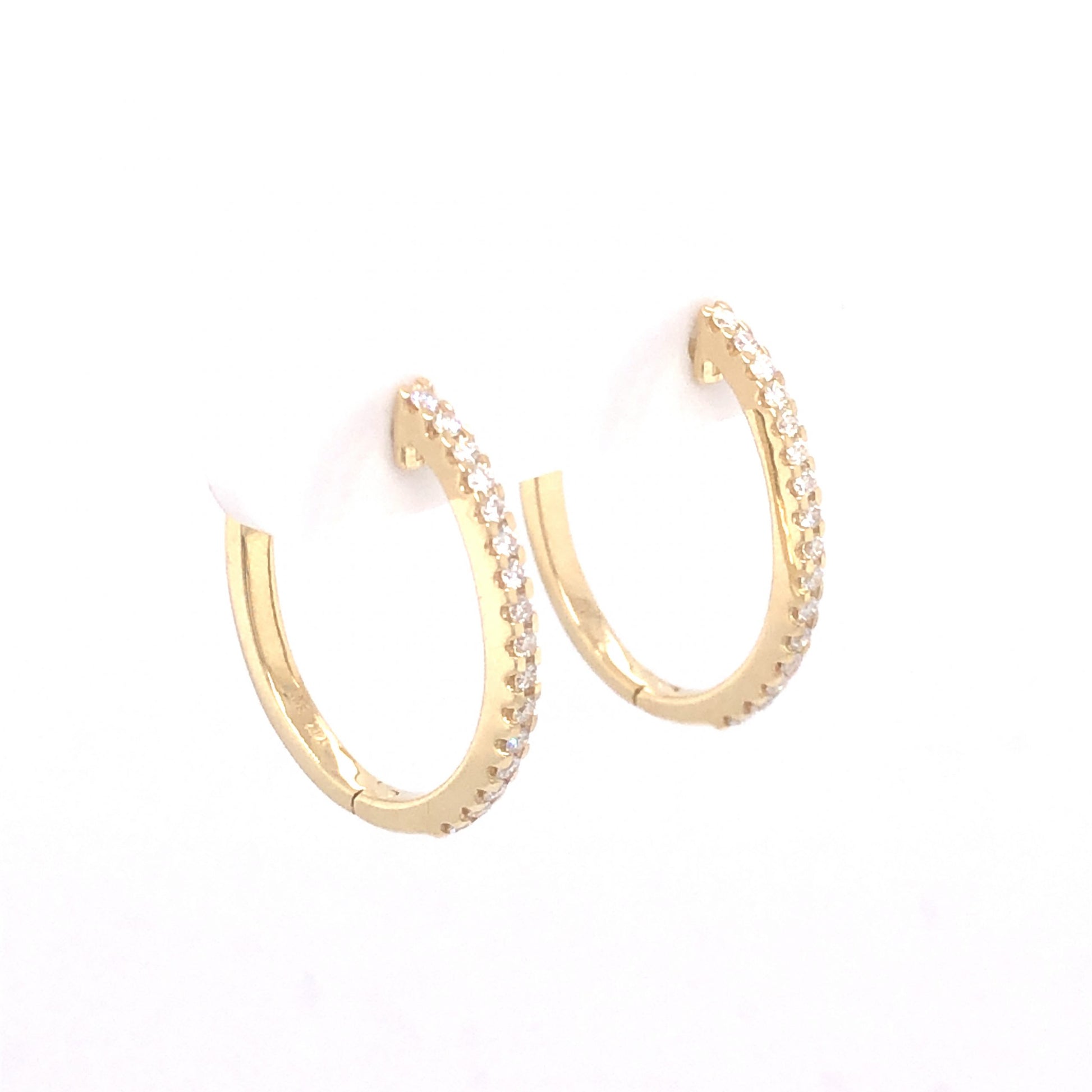 .28 Diamond Oval Hoop Earrings in 14K Yellow Gold