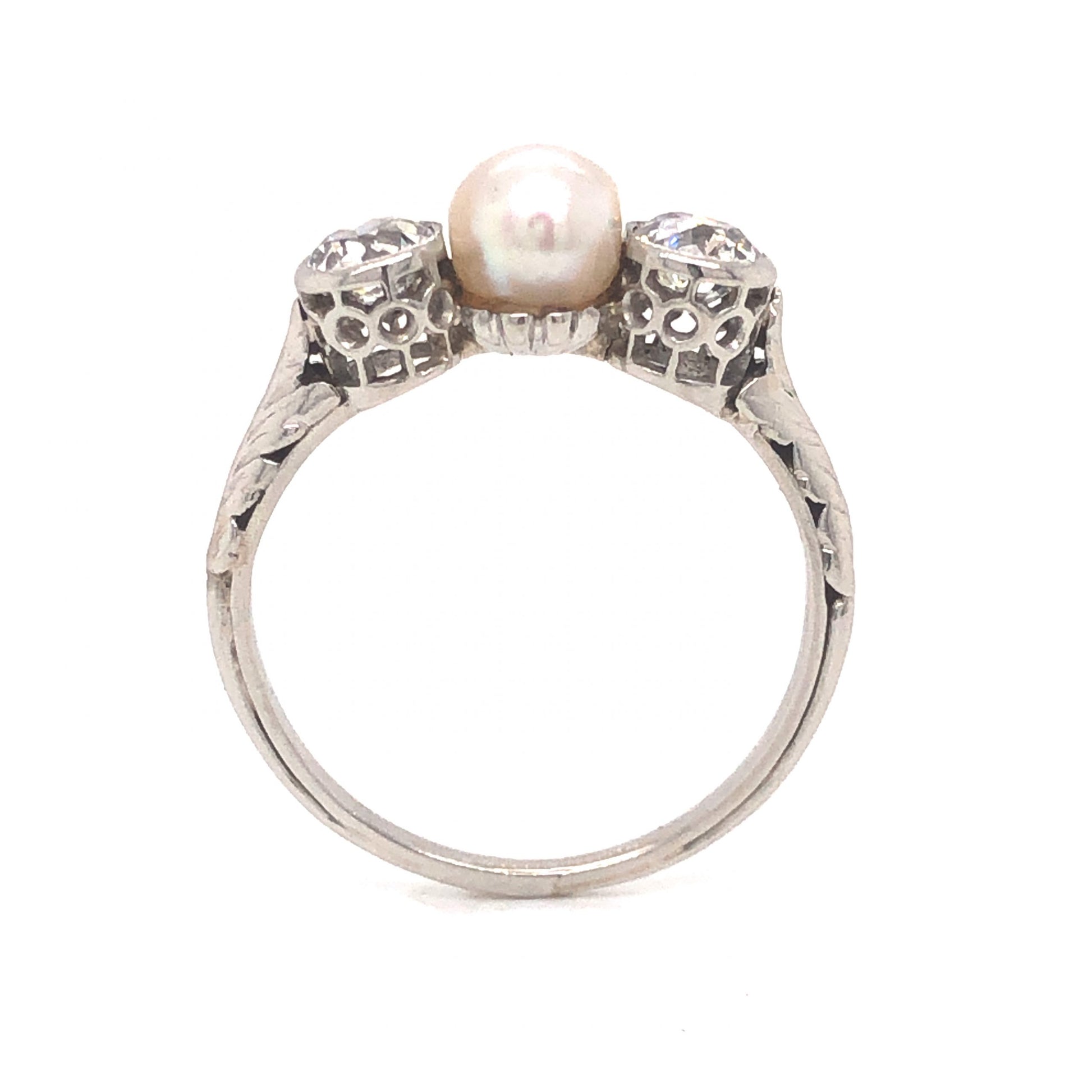 Art Deco Natural Pearl & Diamond Ring in PlatinumComposition: PlatinumRing Size: 6.25Total Diamond Weight: .52 ctTotal Gram Weight: 3.1 g