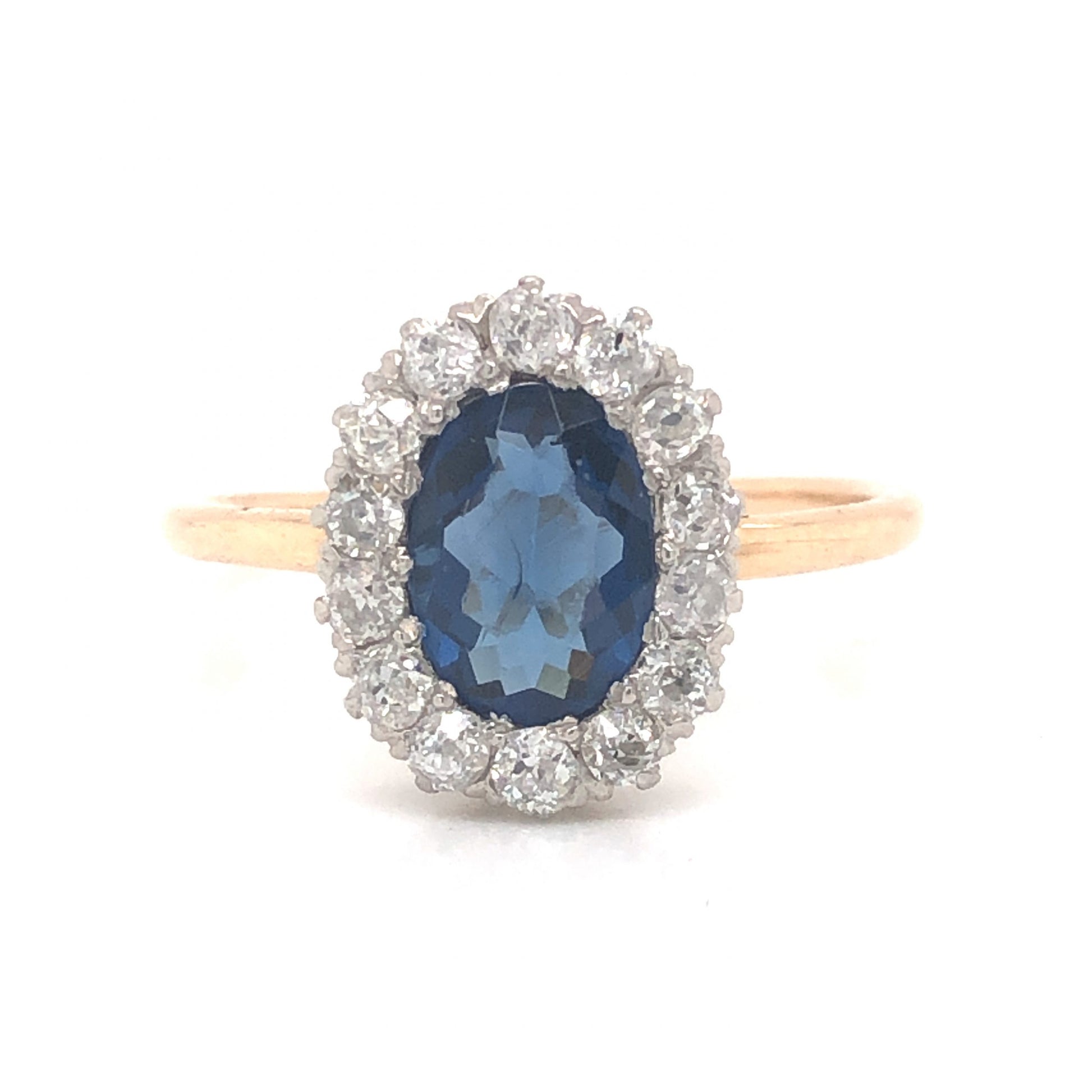 Victorian Oval Cut Sapphire & Diamond Ring in 14k Gold & PlatinumComposition: PlatinumRing Size: 6.25Total Diamond Weight: .56 ctTotal Gram Weight: 2.8 g