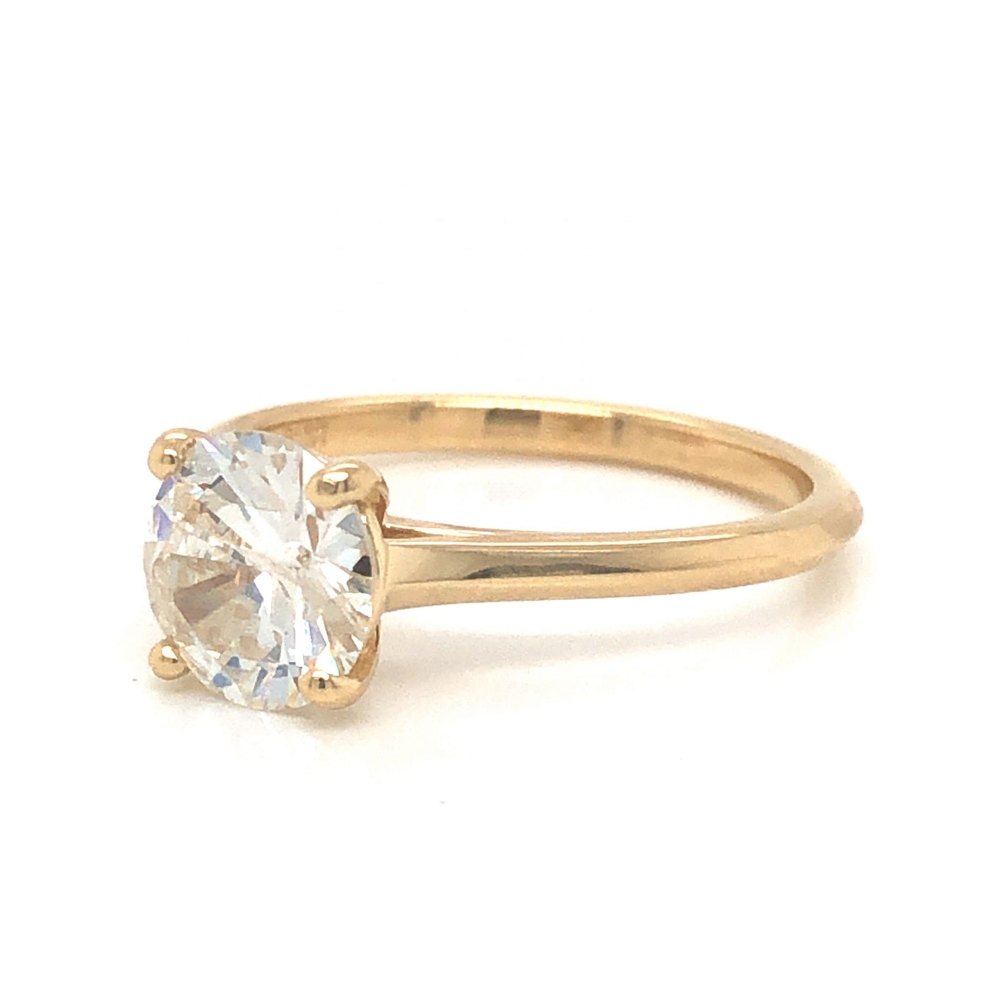 1.44 Solitaire Brilliant Cut Diamond Engagement Ring in 14K Yellow GoldComposition: 14 Karat Yellow Gold Ring Size: 7 Total Diamond Weight: 1.44ct Total Gram Weight: 2.8 g Inscription: 14k 
      