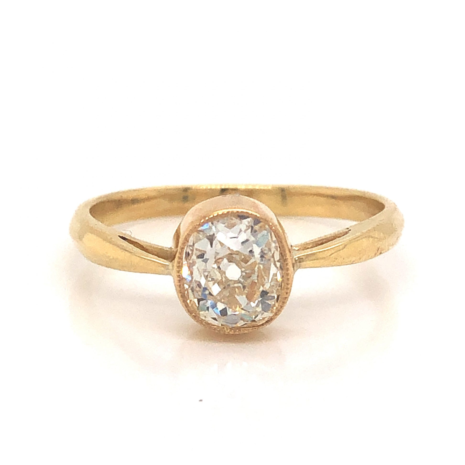 Solitaire Bezel Set Diamond Engagement Ring in 18k Yellow Gold