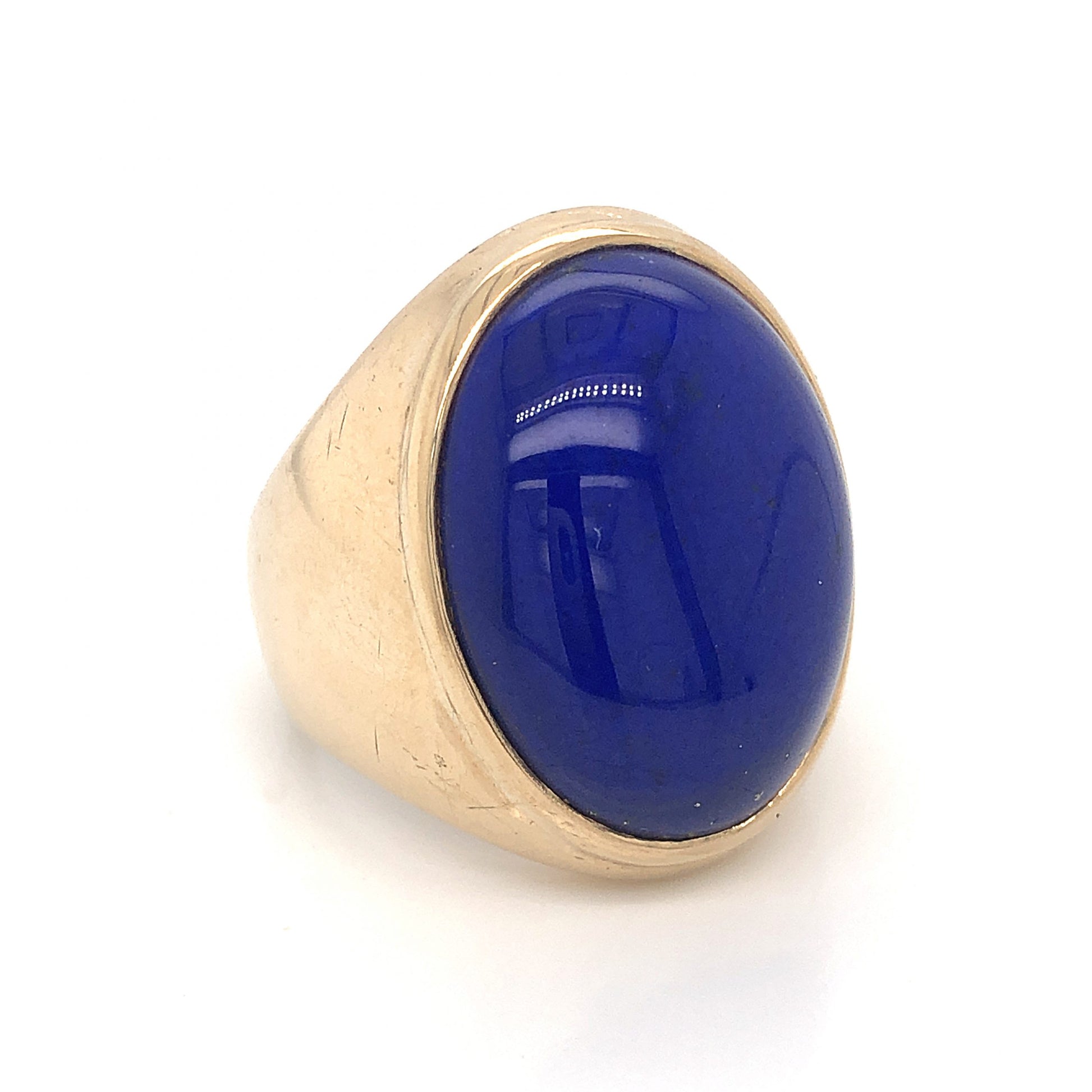 Oval Lapis Lazuli Cocktail Ring in 14k Yellow GoldComposition: 14 Karat Yellow Gold Ring Size: 9.5 Total Gram Weight: 21.1 g