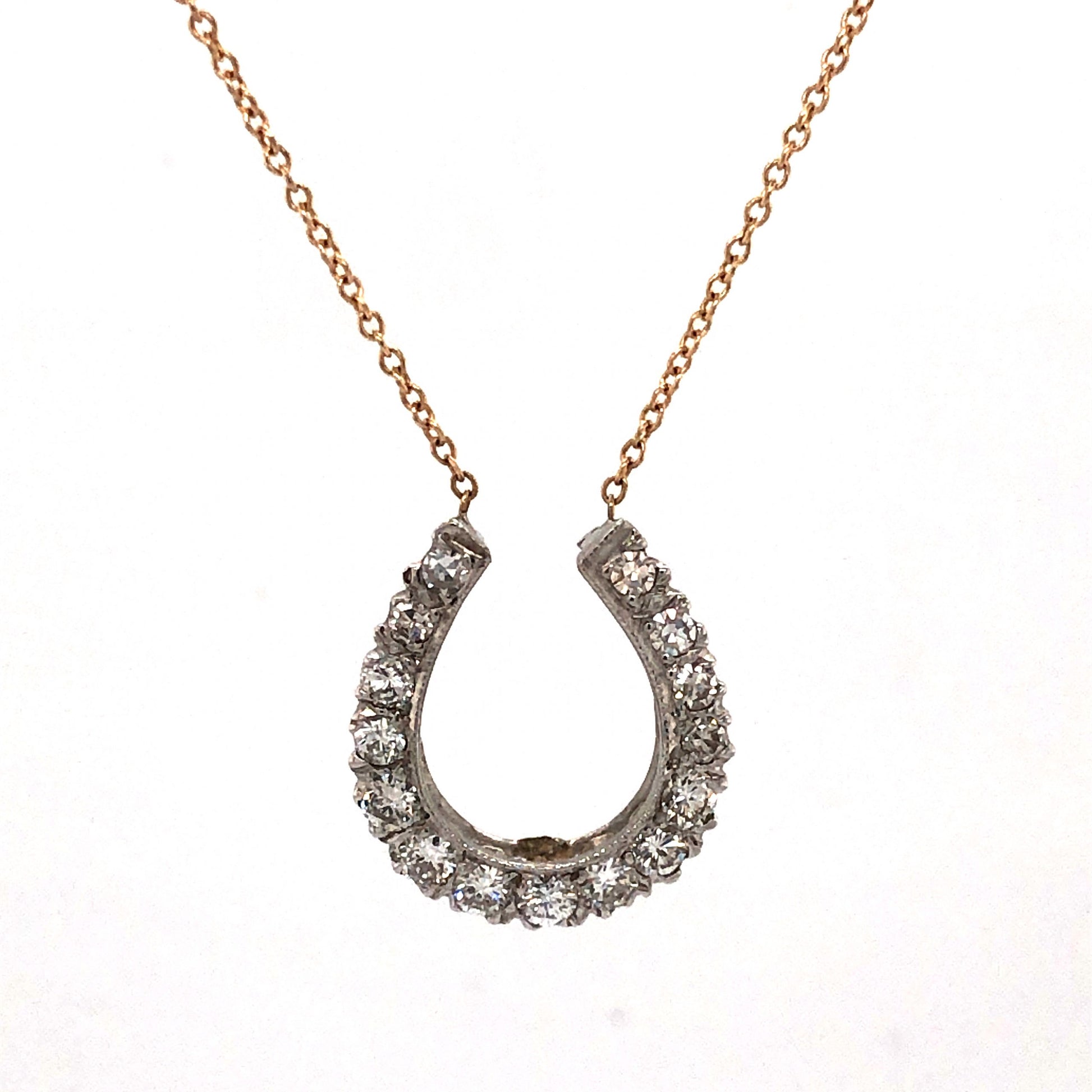 Diamond Horseshoe Pendant Necklace in 14k GoldComposition: Platinum Total Diamond Weight: .73ct Total Gram Weight: 3.8 g Inscription: MSCO 14KT
      