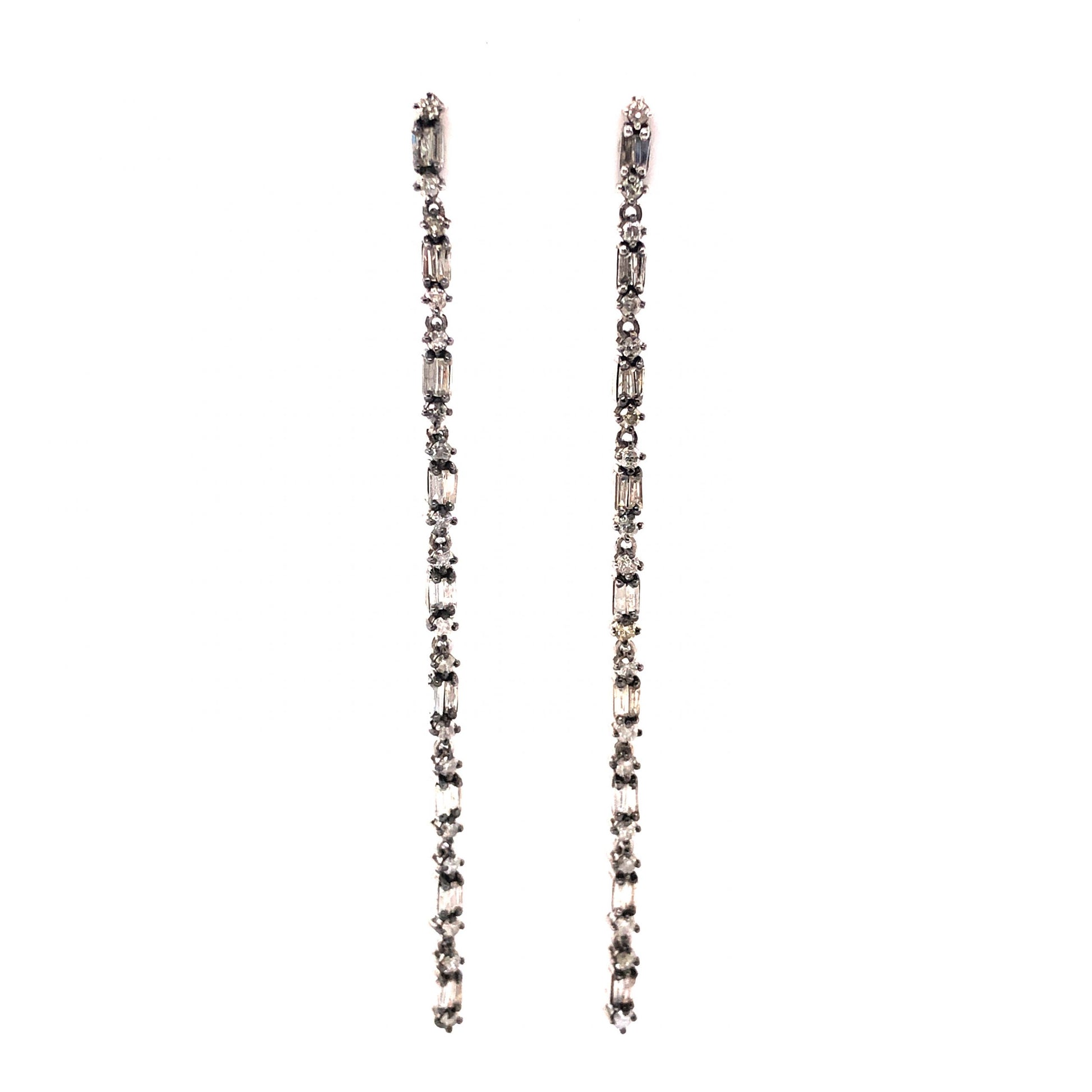 Baguette Cut Diamond Drop Earrings in Sterling SilverComposition: PlatinumTotal Diamond Weight: 2.52 ctTotal Gram Weight: 5.6 gInscription: 14/20 GF