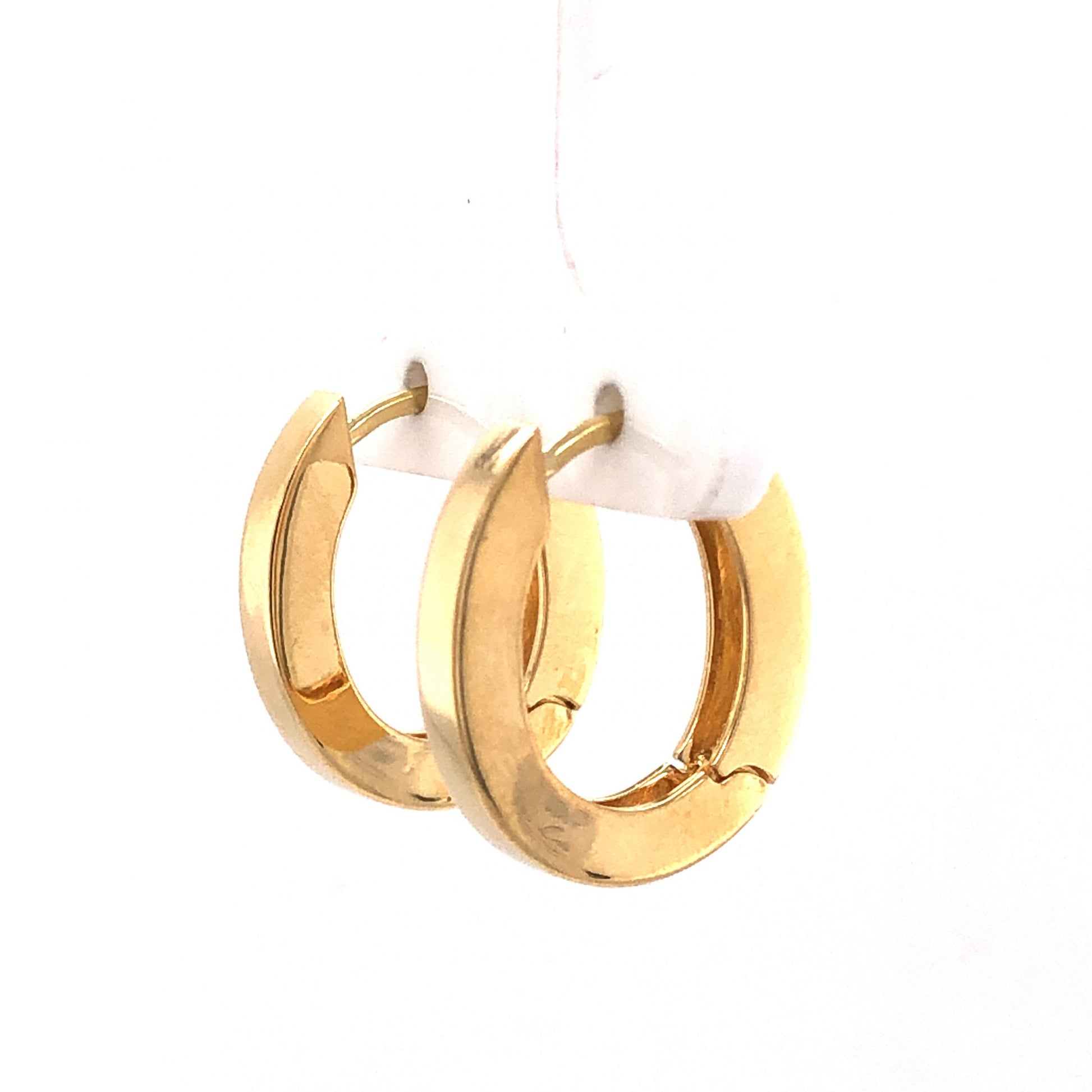 Modern Yellow Gold Oval Hoop Earrings in 18kComposition: 18 Karat Yellow Gold Total Gram Weight: 8.8 g