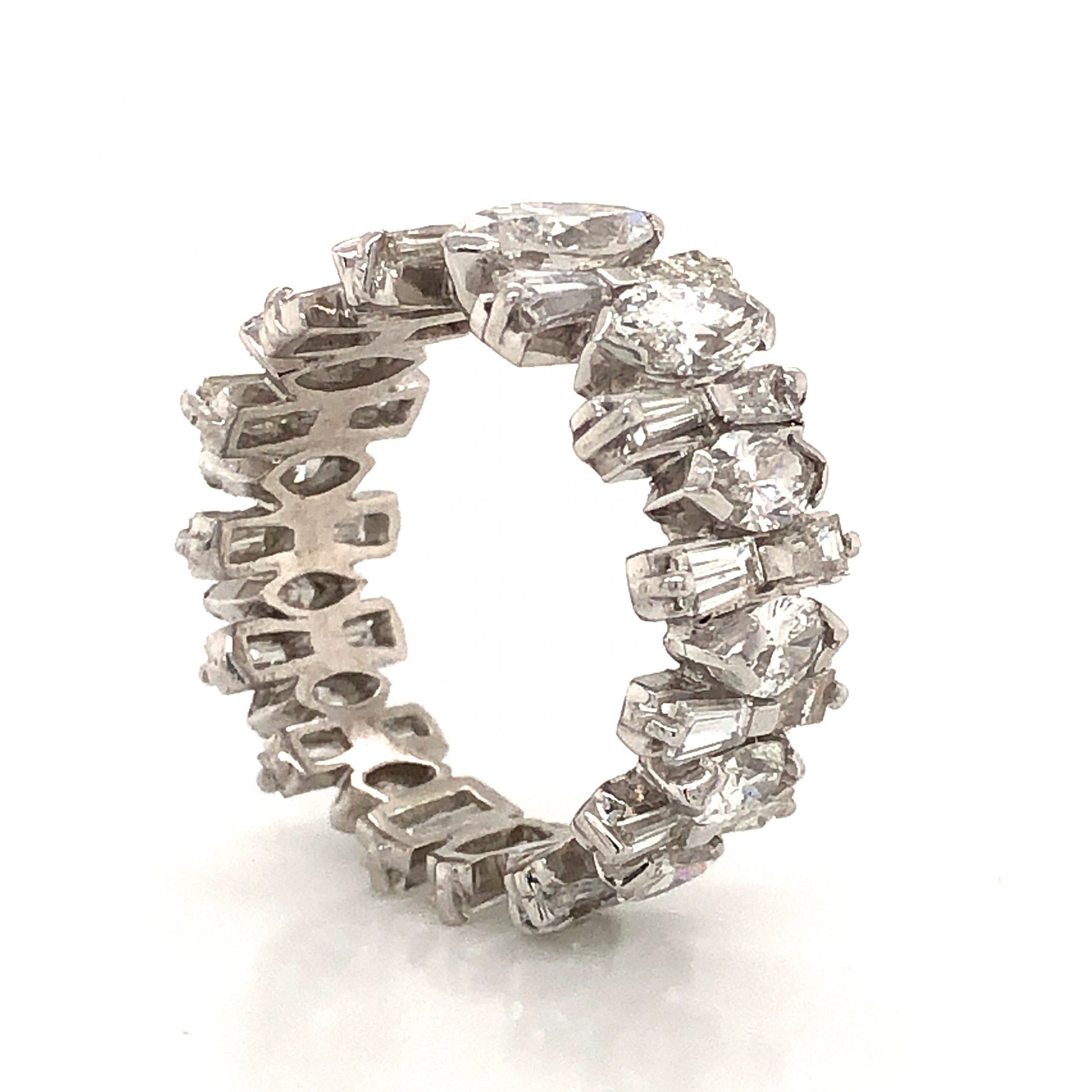 Marquise & Baguette Cut Diamond Eternity Ring in PlatinumComposition: PlatinumRing Size: 7Total Diamond Weight: 5.05 ctTotal Gram Weight: 9.5 g