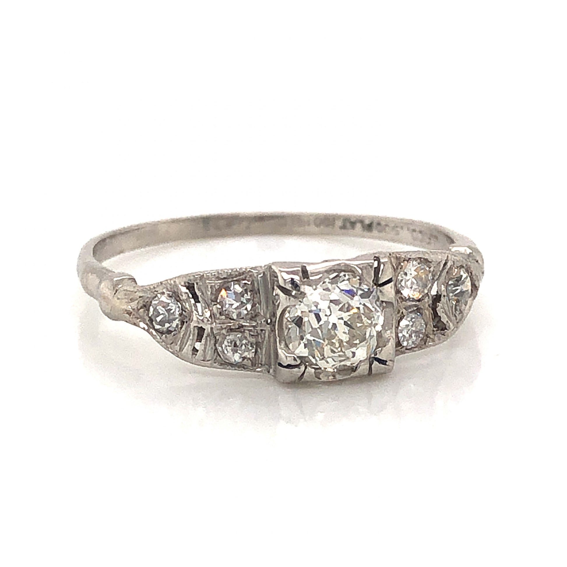 .43 Art Deco Diamond Engagement Ring in PlatinumComposition: Platinum Ring Size: 7 Total Diamond Weight: .58 cttwct Total Gram Weight: 2.0 g Inscription: J.F. CO. 900 PLAT 100 IRID, 346
      