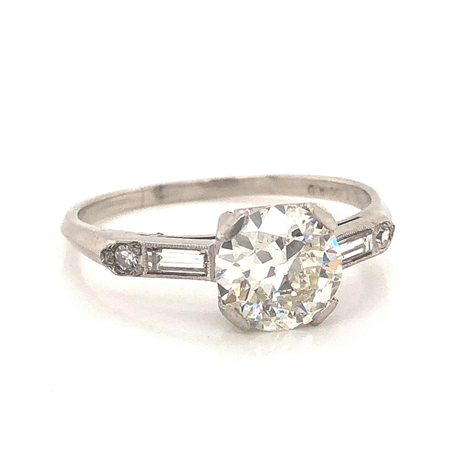 1.14 Art Deco Diamond Engagement Ring in PlatinumComposition: PlatinumRing Size: 7Total Diamond Weight: 1.47 ctTotal Gram Weight: 3.3 gInscription: 900 PLAT 100 IRID