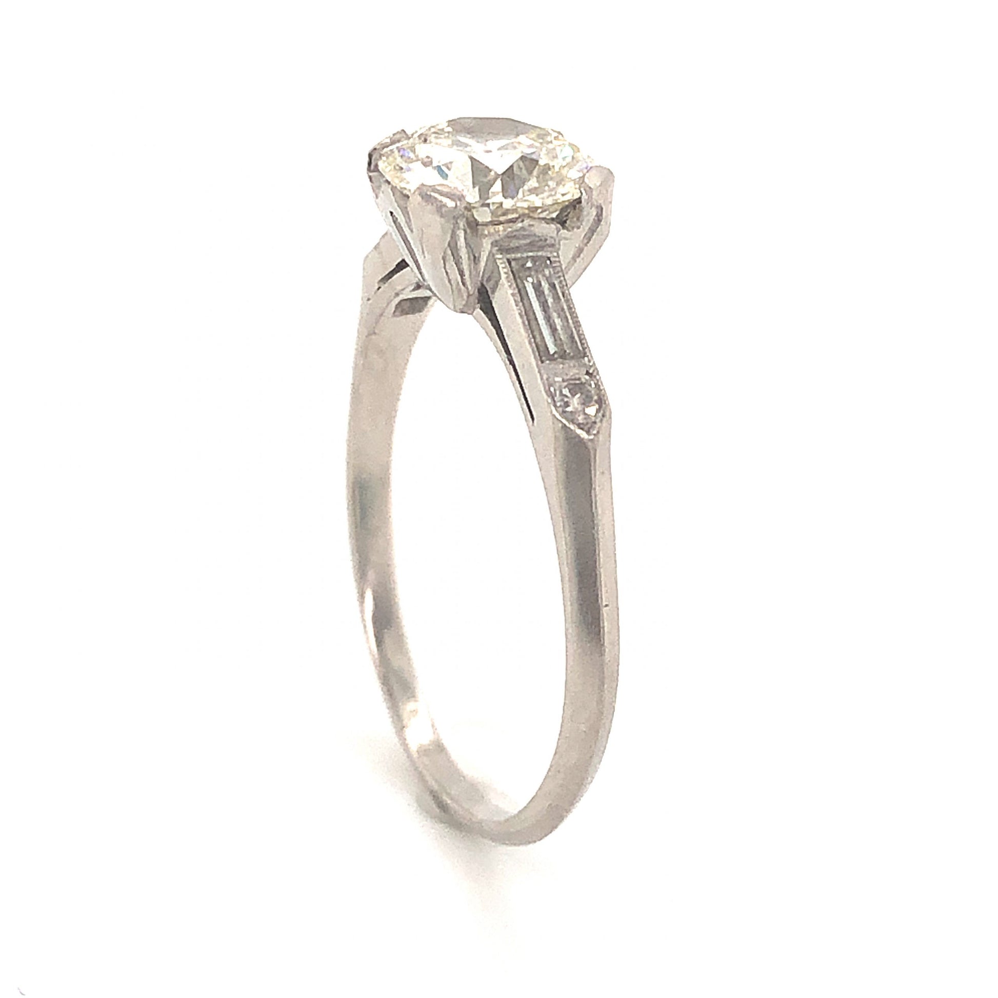 1.14 Art Deco Diamond Engagement Ring in PlatinumComposition: PlatinumRing Size: 7Total Diamond Weight: 1.47 ctTotal Gram Weight: 3.3 gInscription: 900 PLAT 100 IRID