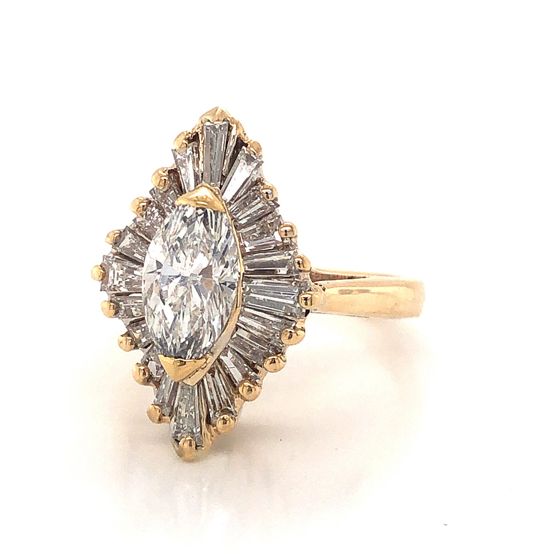 Ballerina Halo Marquise Cut Diamond Engagement Ring in 14KComposition: 14 Karat Yellow Gold Ring Size: 5.25 Total Diamond Weight: 2.22ct Total Gram Weight: 4.9 g