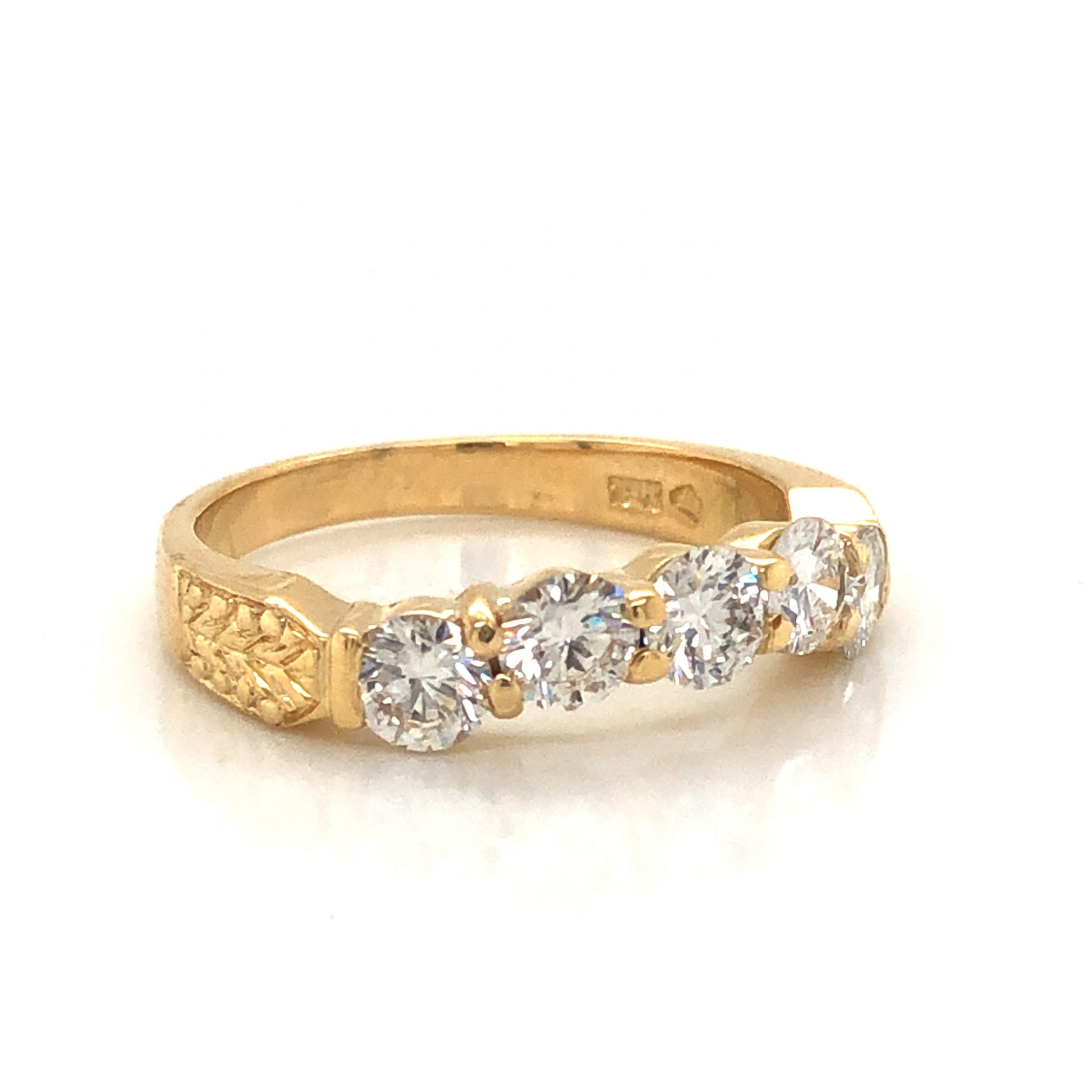 1.15 Curved Diamond Wedding Band in 18k Yellow GoldComposition: 18 Karat Yellow Gold Ring Size: 6.5 Total Diamond Weight: 1.15ct Total Gram Weight: 4.0 g Inscription: 18K 
      