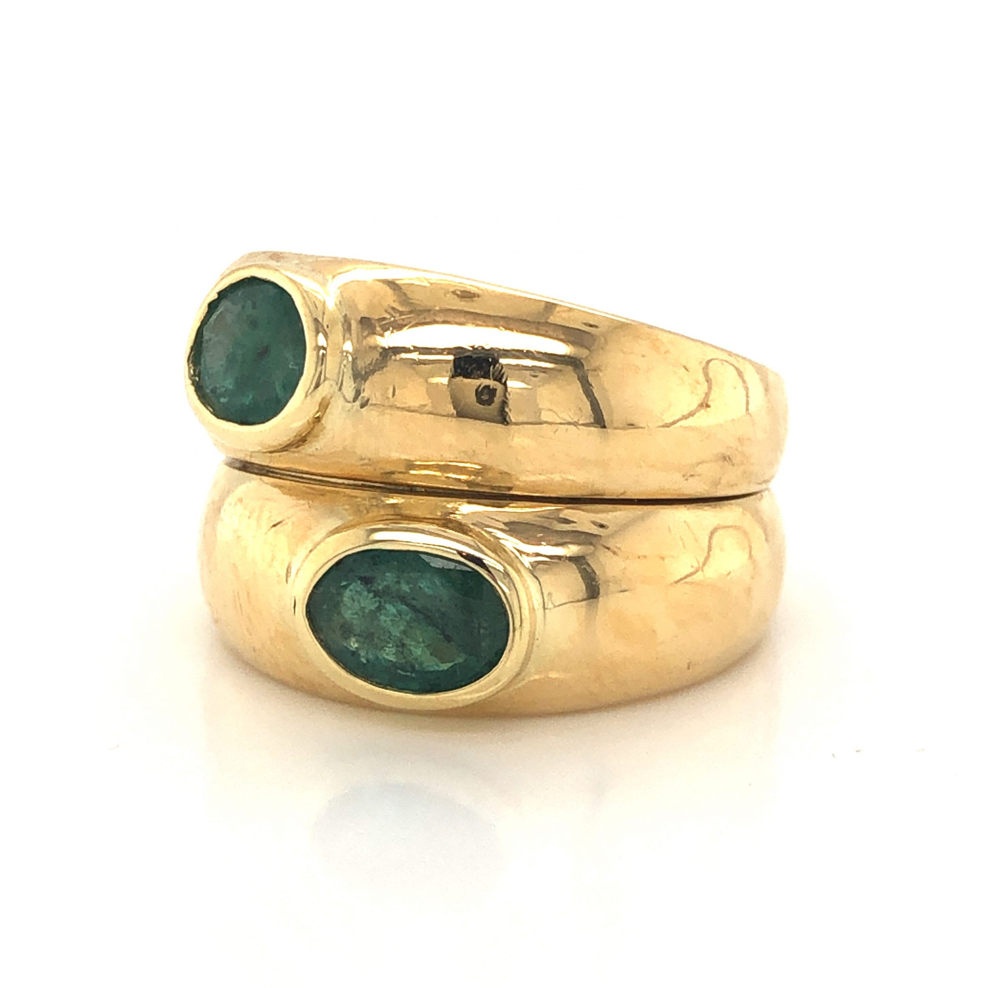 Stacked Oval Cut Emerald Cocktail Ring in 18k Yellow GoldComposition: 18 Karat Yellow GoldRing Size: 6Total Gram Weight: 8.6 gInscription: 750