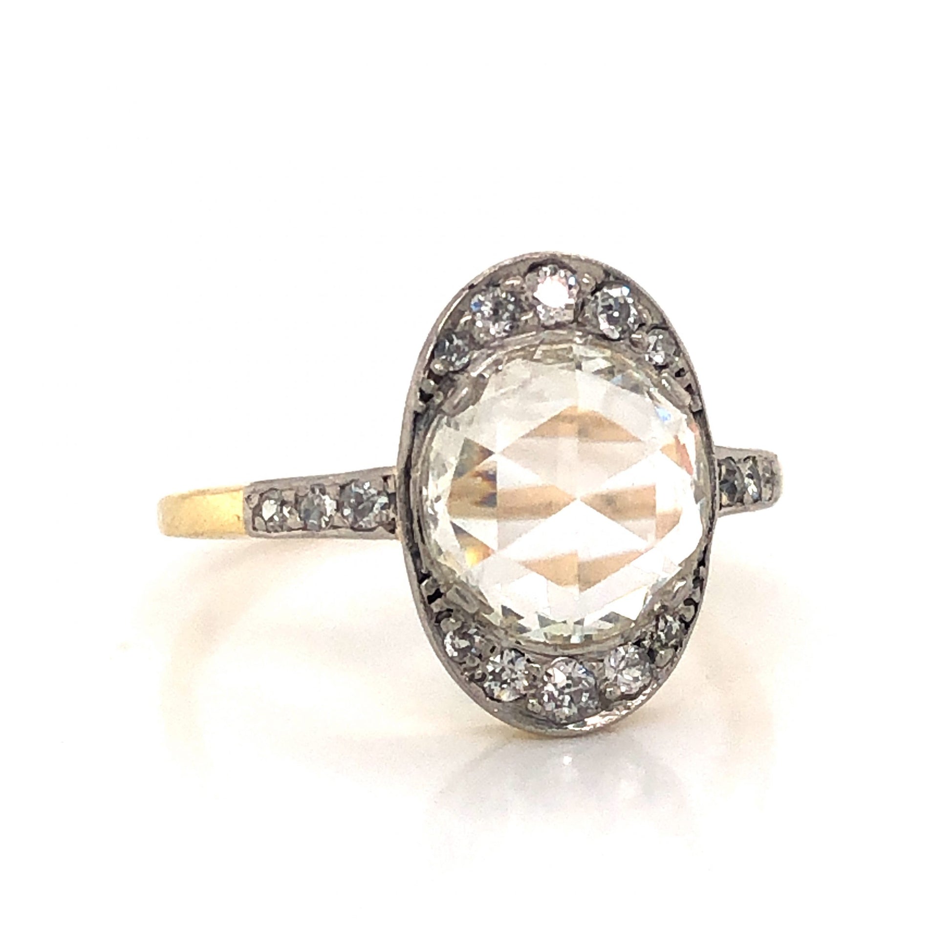 Victorian Round Rose Cut Diamond Engagement Ring in 14kComposition: 14 Karat White Gold/14 Karat Yellow Gold Ring Size: 7 Total Diamond Weight: 1.79ct Total Gram Weight: 2.4 g