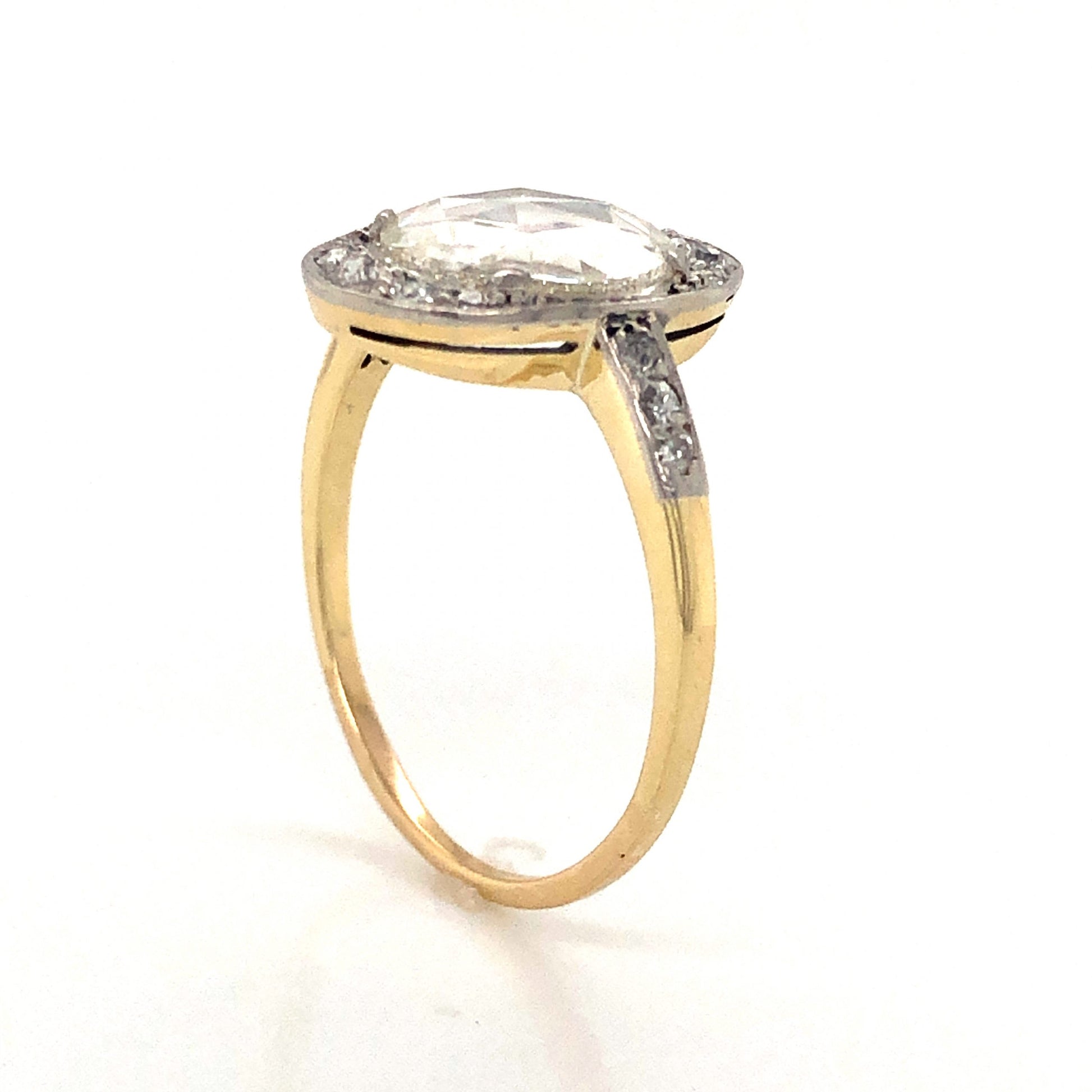 Victorian Round Rose Cut Diamond Engagement Ring in 14kComposition: 14 Karat White Gold/14 Karat Yellow Gold Ring Size: 7 Total Diamond Weight: 1.79ct Total Gram Weight: 2.4 g