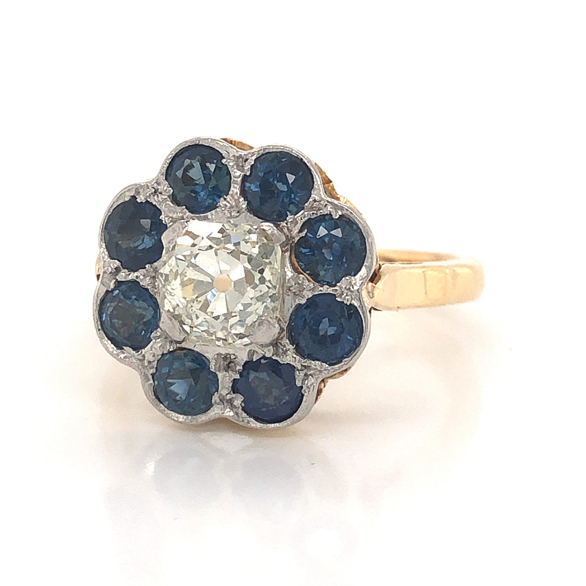 Victorian Sapphire Halo Diamond Engagement Ring in 18k & PlatinumComposition: Platinum/18 Karat Yellow Gold Ring Size: 7.25 Total Diamond Weight: .91ct Total Gram Weight: 5.3 g Inscription: 18CT PLAT
      