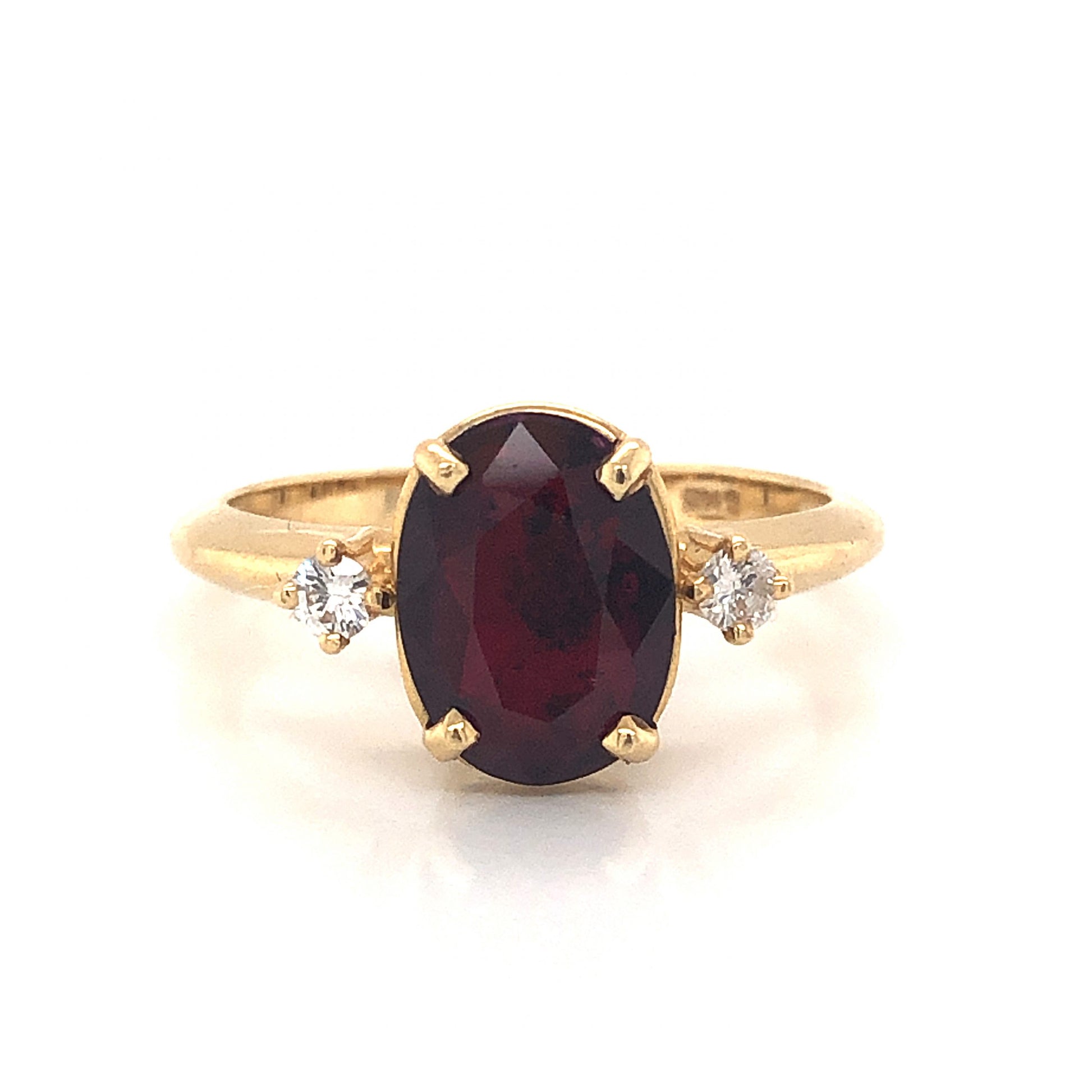 Oval Cut Ruby Engagement Ring in 14k Yellow GoldComposition: 14 Karat Yellow Gold Ring Size: 6.5 Total Diamond Weight: .10ct Total Gram Weight: 2.7 g Inscription: 14k
      