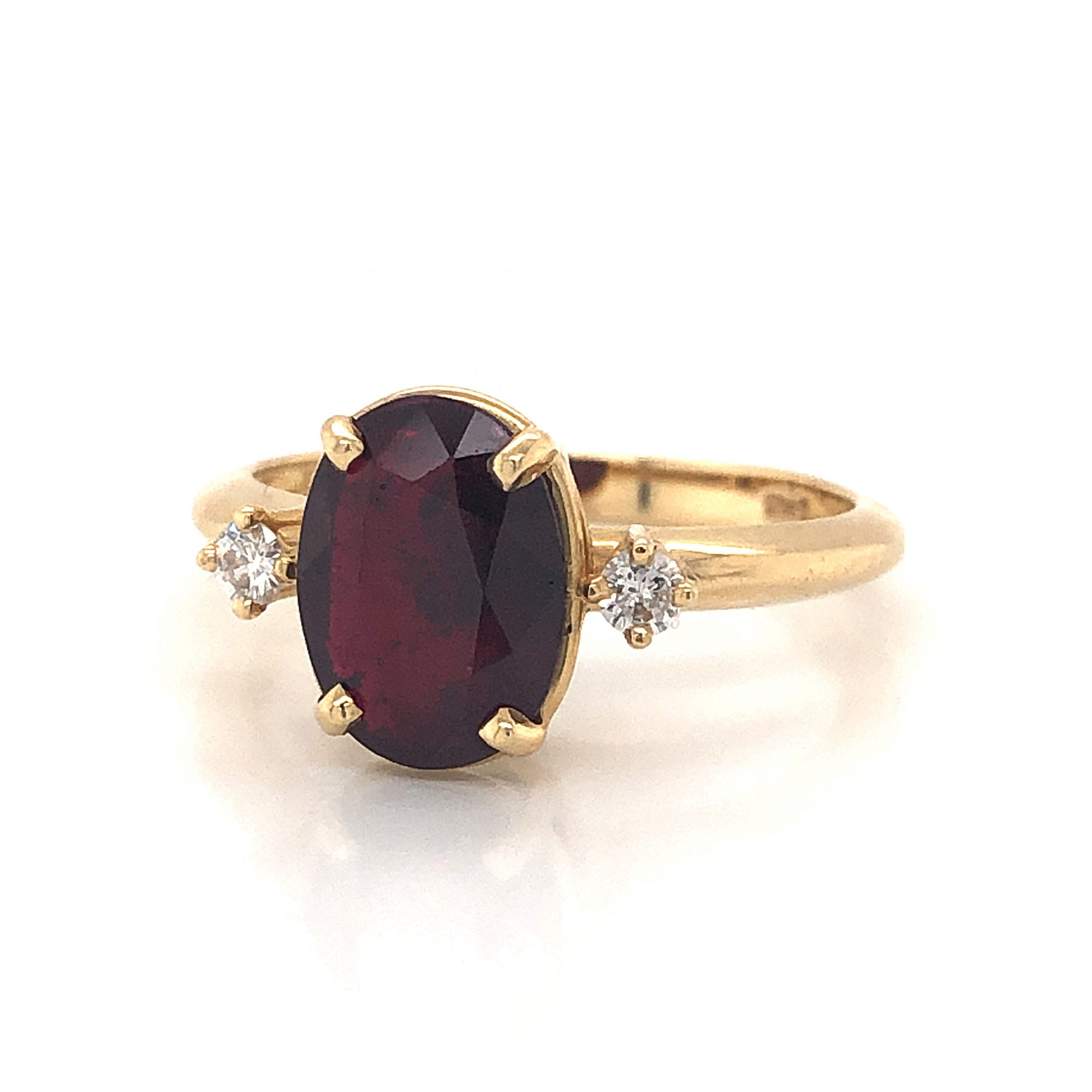 Oval Cut Ruby Engagement Ring in 14k Yellow GoldComposition: 14 Karat Yellow Gold Ring Size: 6.5 Total Diamond Weight: .10ct Total Gram Weight: 2.7 g Inscription: 14k
      