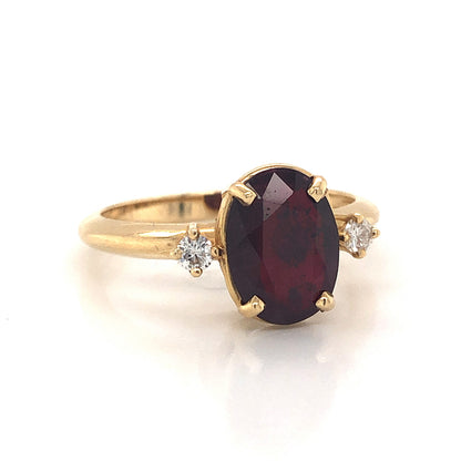 Oval Cut Ruby Engagement Ring in 14k Yellow Gold
