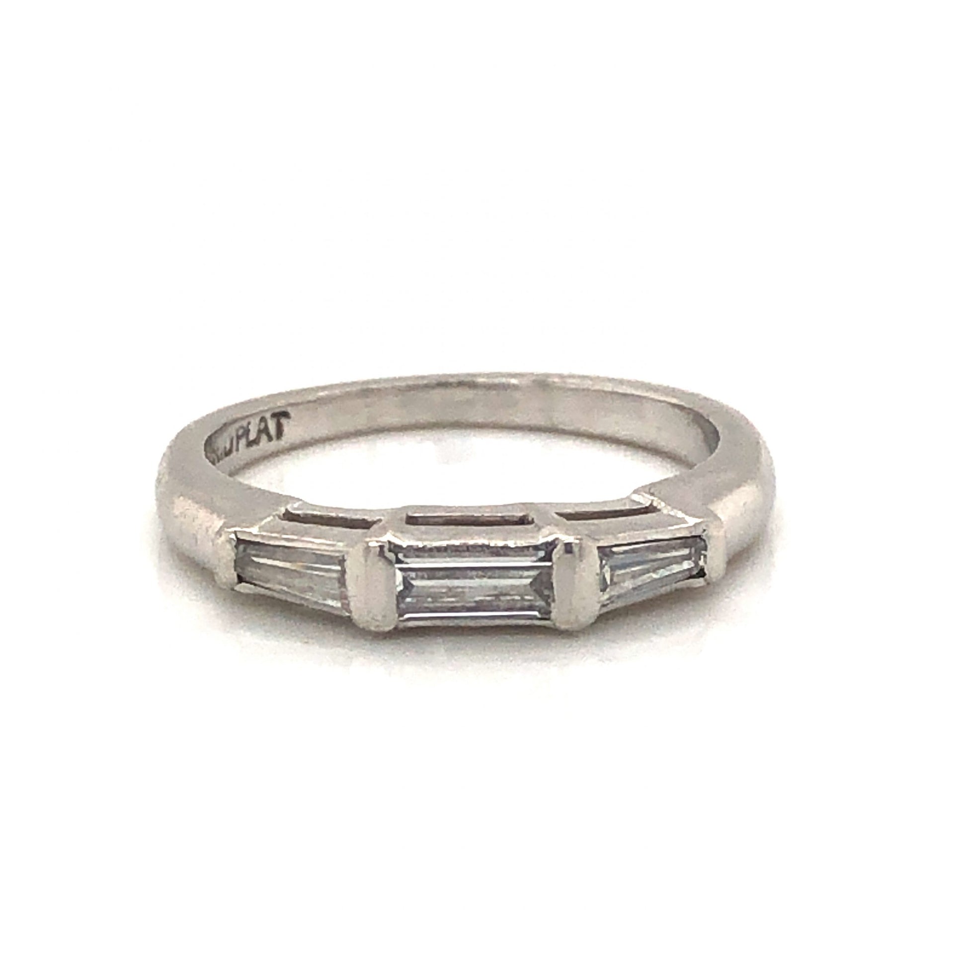 Art Deco Baguette Diamond Wedding Band in PlatinumComposition: Platinum Ring Size: 3.5 Total Diamond Weight: .22ct Total Gram Weight: 2.9 g Inscription: 10% IRID PLAT
      