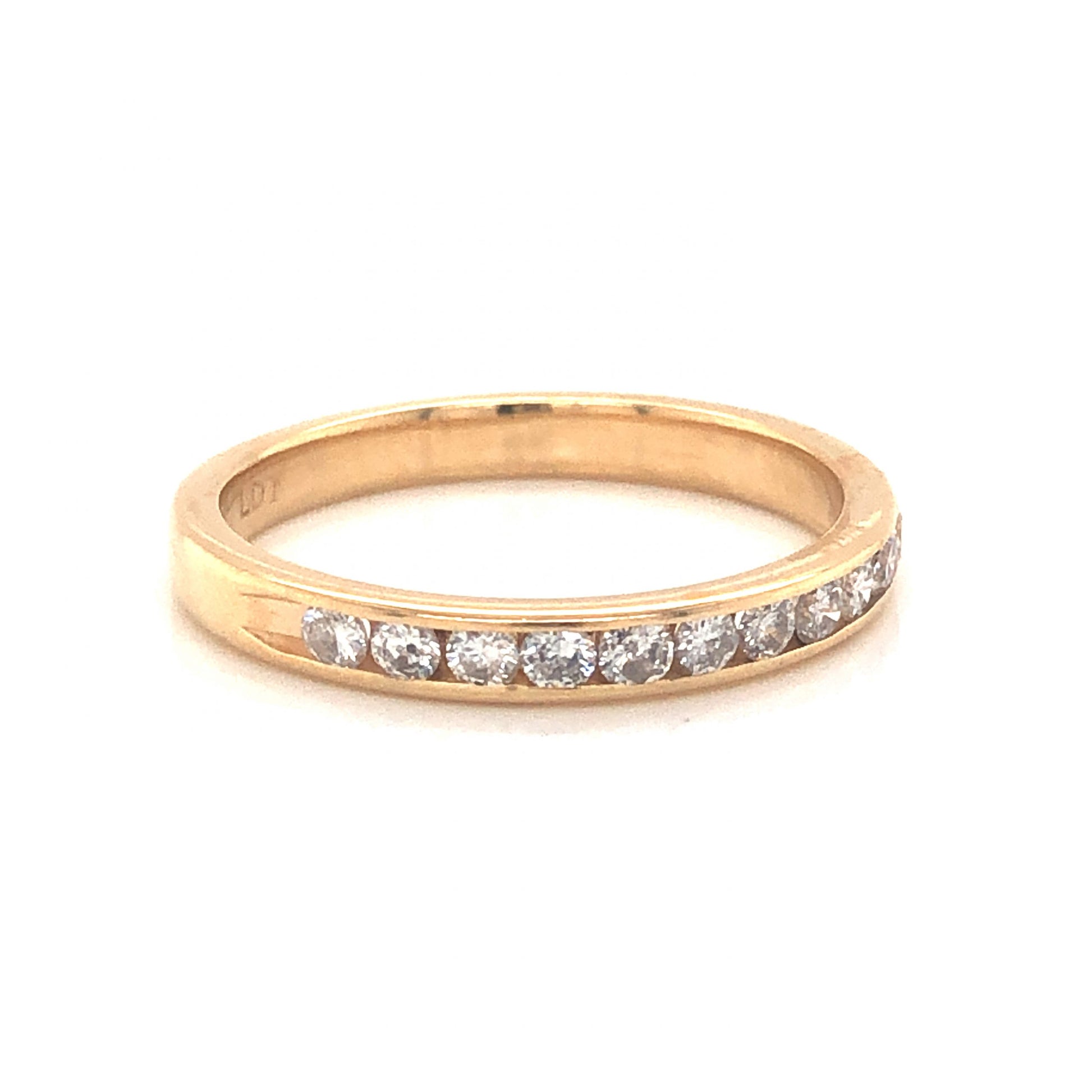 .33 Channel Set Diamond Wedding Band in 14k Yellow GoldComposition: 14 Karat Yellow Gold Ring Size: 7 Total Diamond Weight: .33ct Total Gram Weight: 2.2 g Inscription: 14k LDT
      
