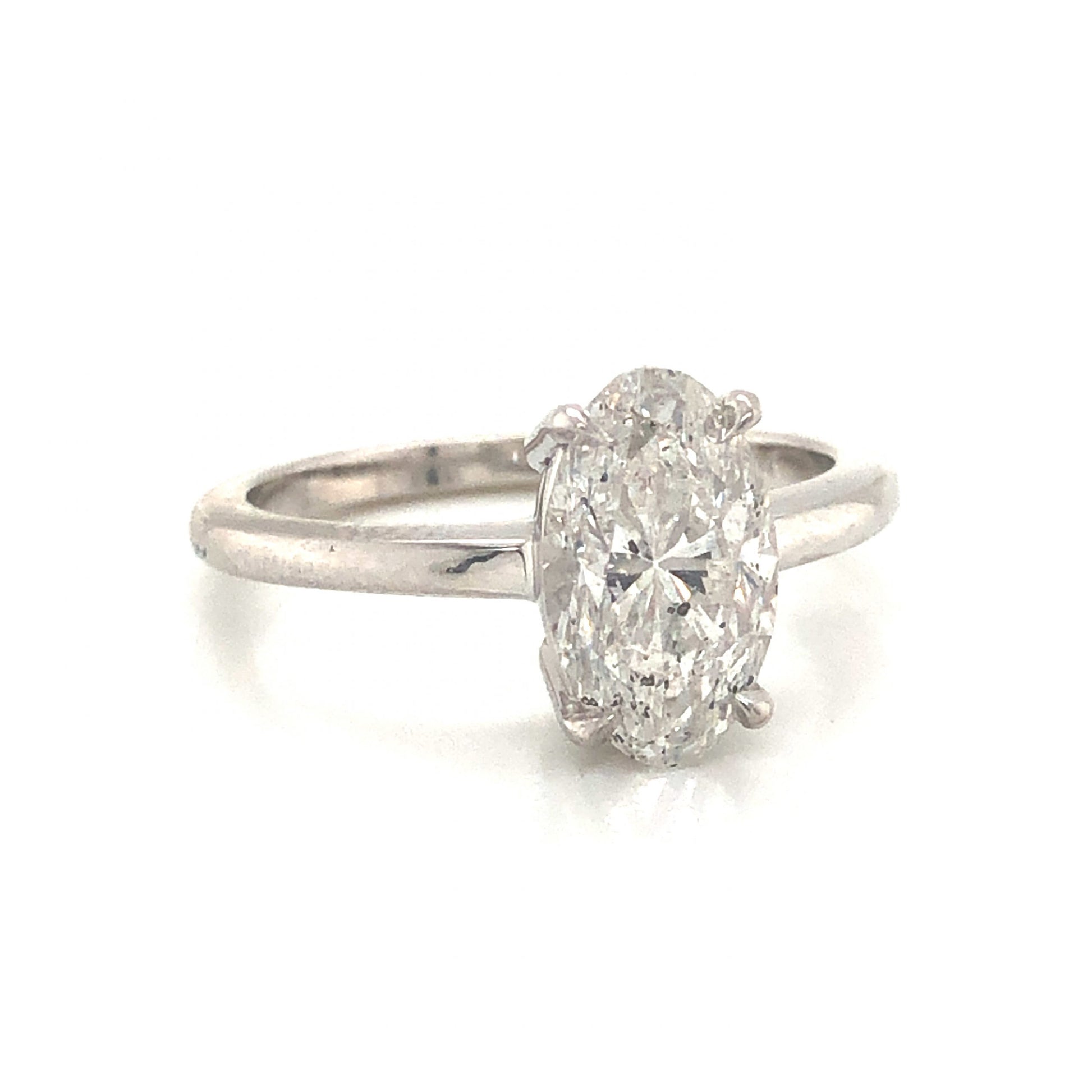 1.78 Oval Cut Diamond Engagement Ring in 14k White GoldComposition: Platinum Ring Size: 6 Total Diamond Weight: 1.78ct Total Gram Weight: 3.3 g Inscription: 14k
      