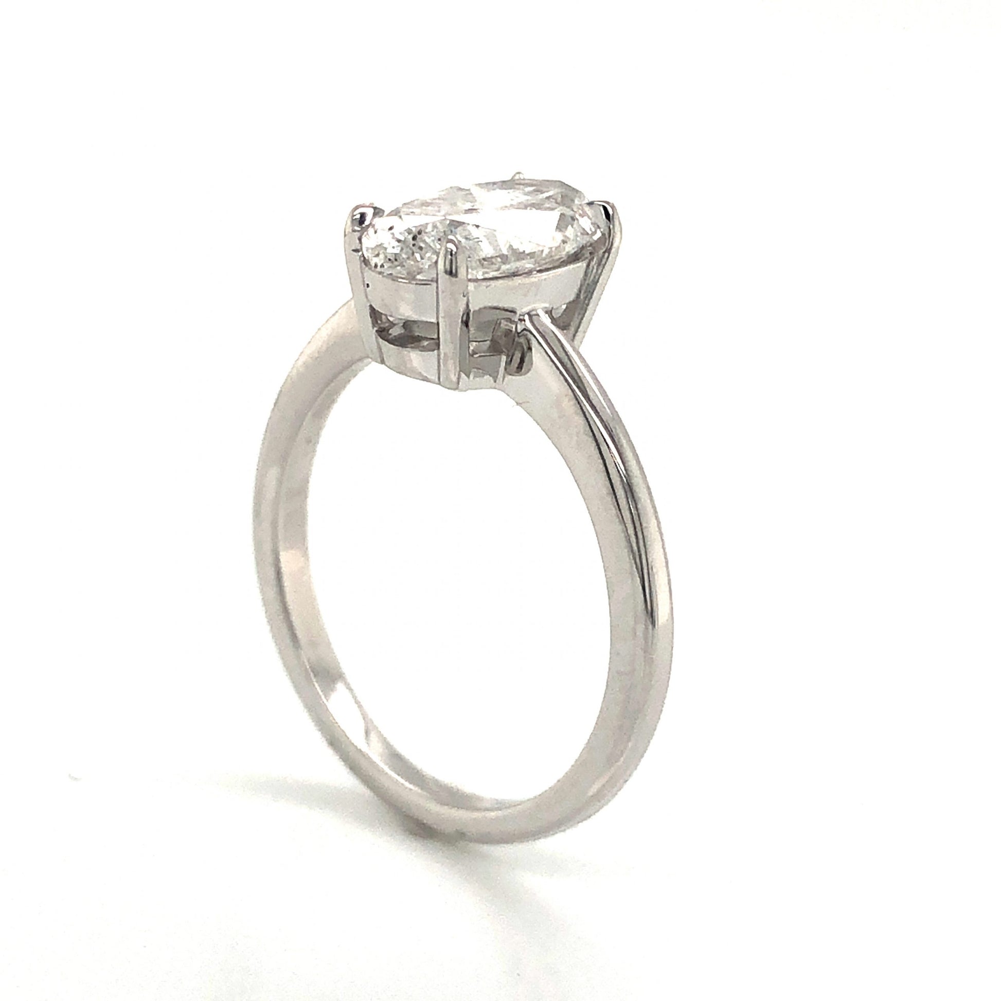 1.78 Oval Cut Diamond Engagement Ring in 14k White GoldComposition: Platinum Ring Size: 6 Total Diamond Weight: 1.78ct Total Gram Weight: 3.3 g Inscription: 14k
      