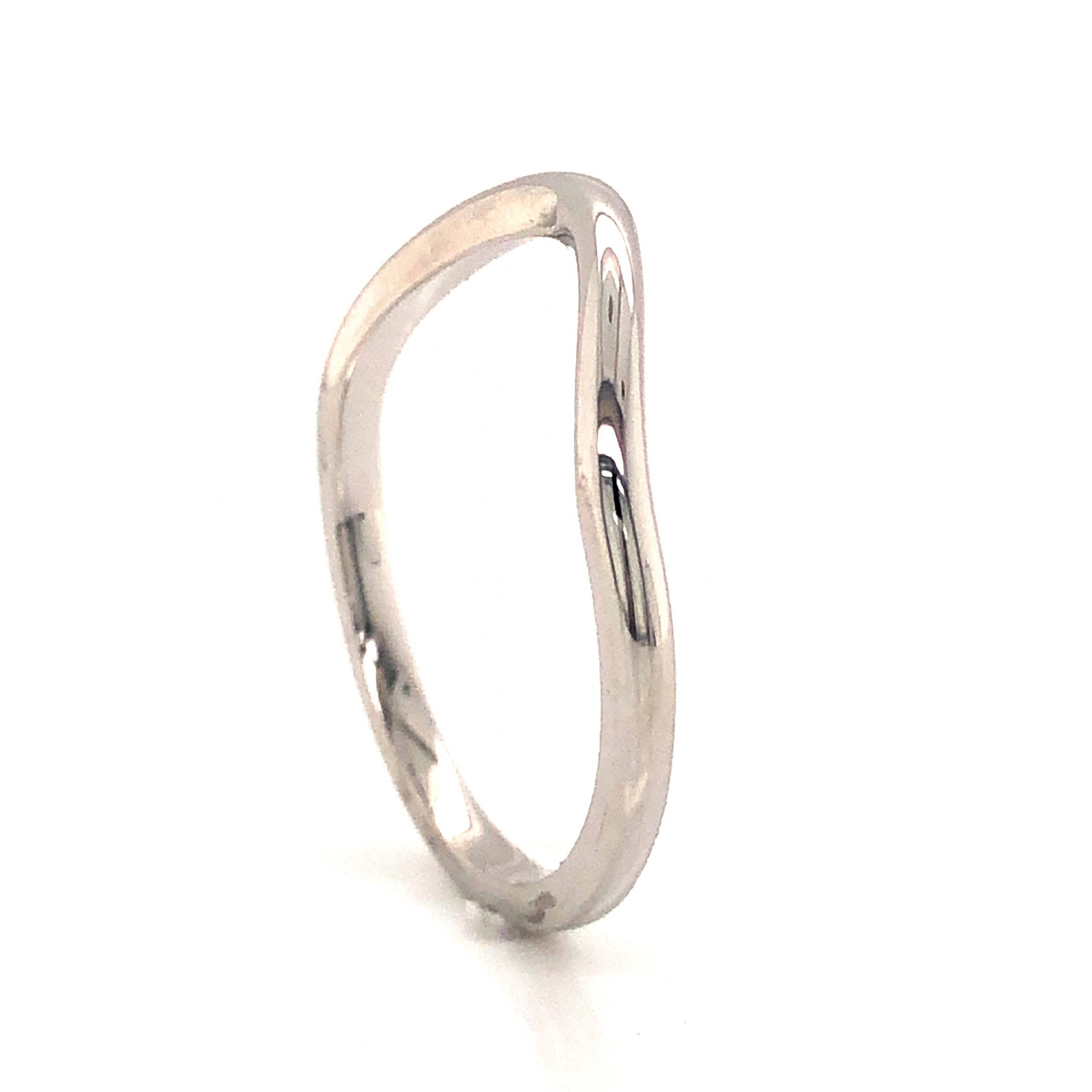 Thin Round Curved Wedding Band in 14k White GoldComposition: 14 Karat White GoldRing Size: 7Total Gram Weight: 2.2 gInscription: 14k
