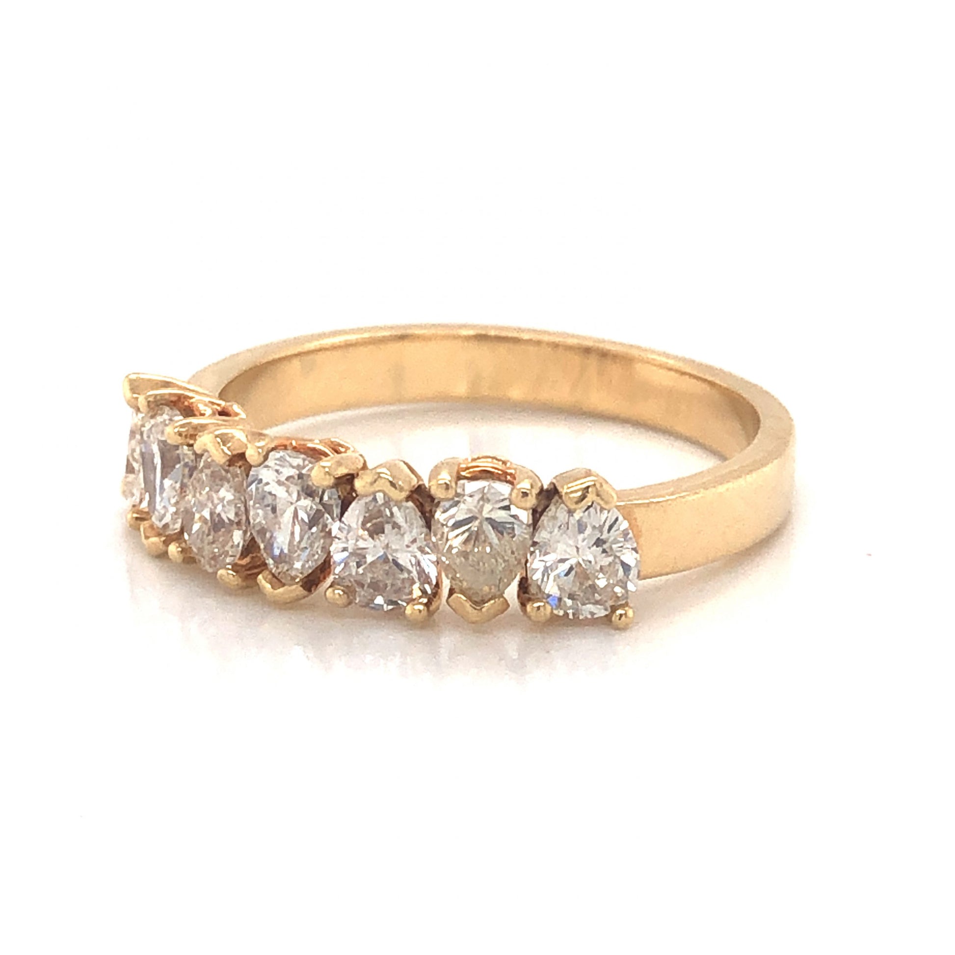 Pear Cut Diamond Wedding Band in 14k Yellow GoldComposition: 14 Karat Yellow Gold Ring Size: 7 Total Diamond Weight: 1.05ct Total Gram Weight: 3.4 g Inscription: 14k
      