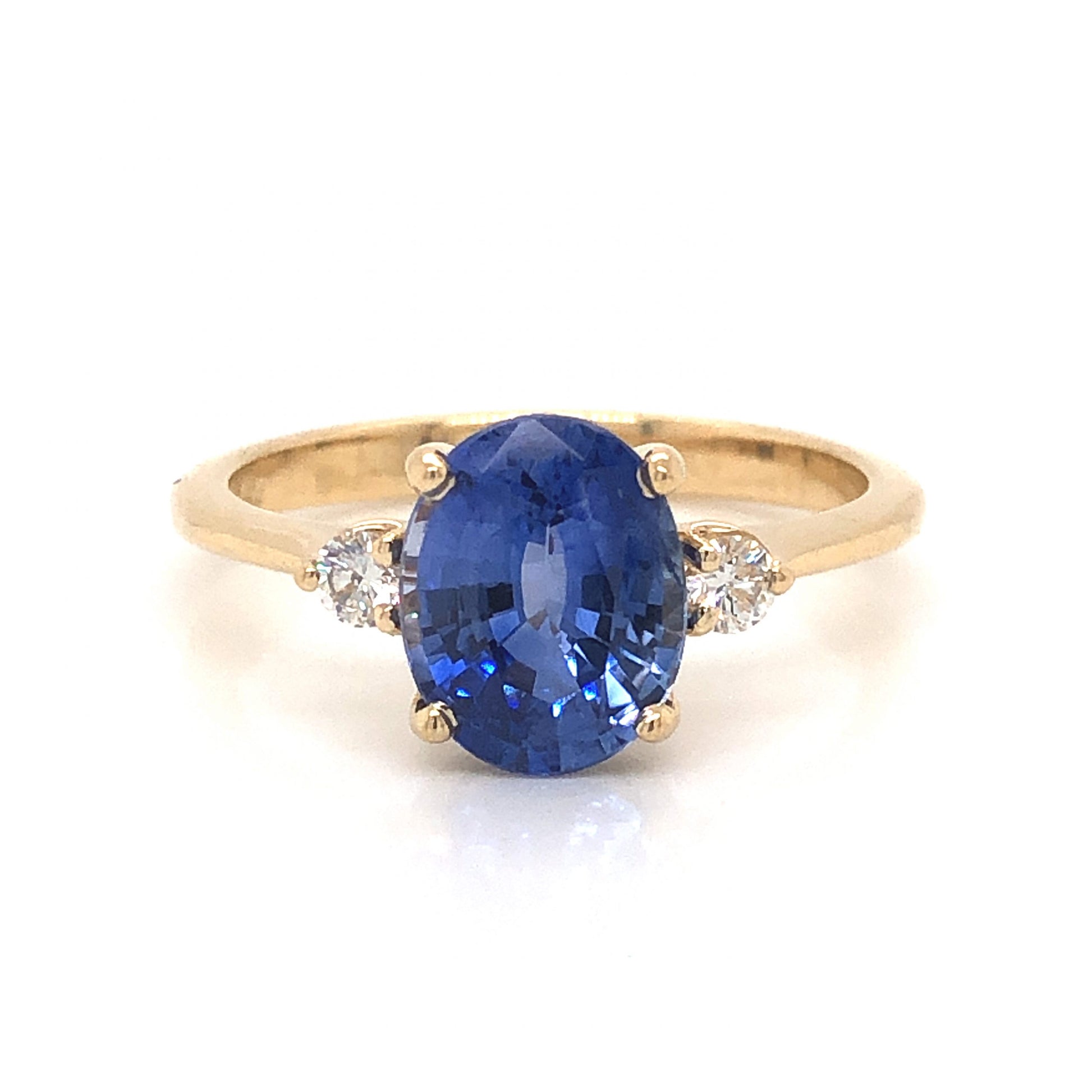 2.23 Oval Cut Sapphire Engagement Ring in Yellow GoldComposition: 14 Karat Yellow Gold Ring Size: 6.75 Total Diamond Weight: .12ct Total Gram Weight: 3.0 g Inscription: 14k
      