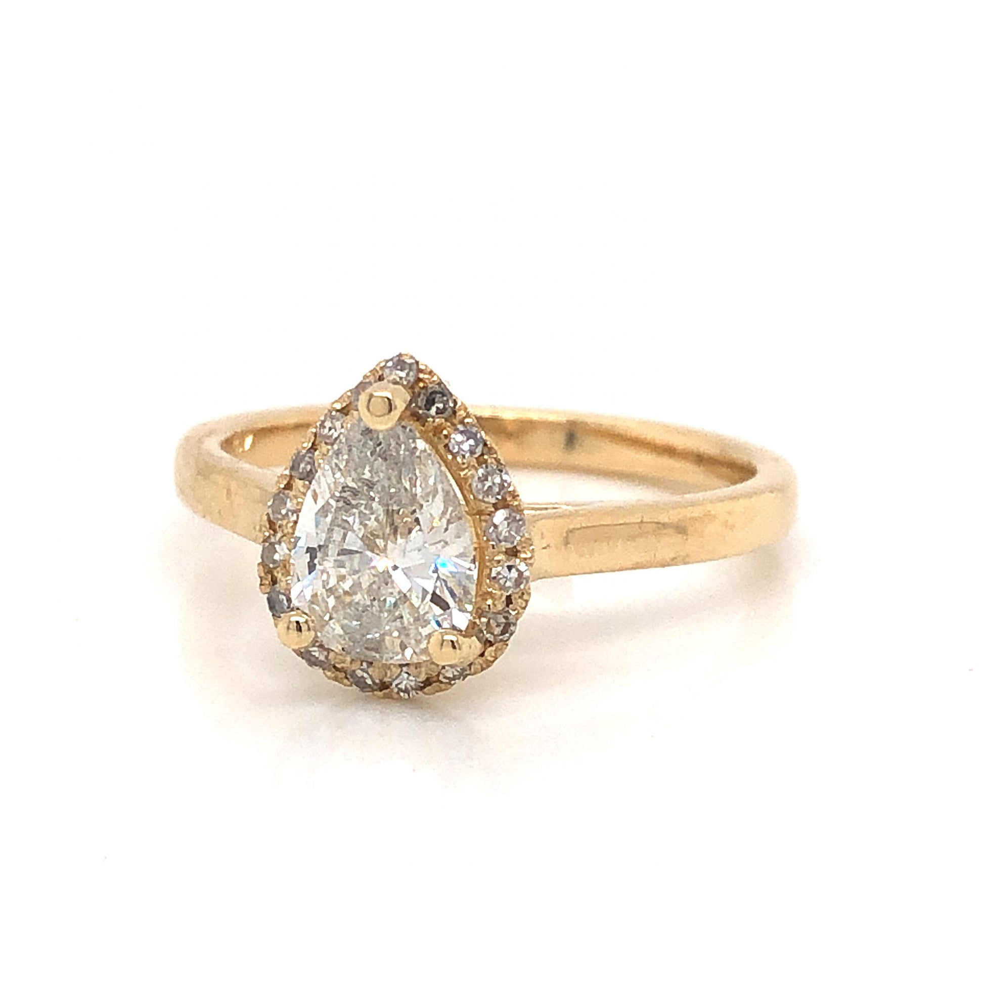 Pear Cut Diamond Halo Engagement Ring in 14k Yellow GoldComposition: 14 Karat Yellow Gold Ring Size: 7 Total Diamond Weight: .99ct Total Gram Weight: 3.2 g Inscription: 14k 
      