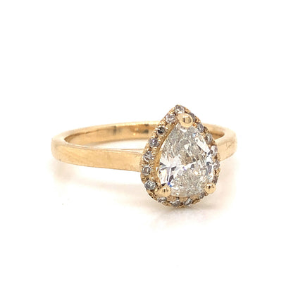 Pear Cut Diamond Halo Engagement Ring in 14k Yellow Gold