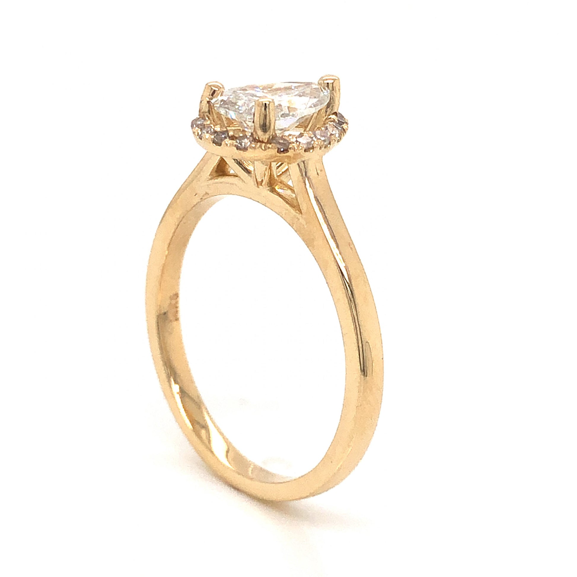 Pear Cut Diamond Halo Engagement Ring in 14k Yellow GoldComposition: 14 Karat Yellow Gold Ring Size: 7 Total Diamond Weight: .99ct Total Gram Weight: 3.2 g Inscription: 14k 
      