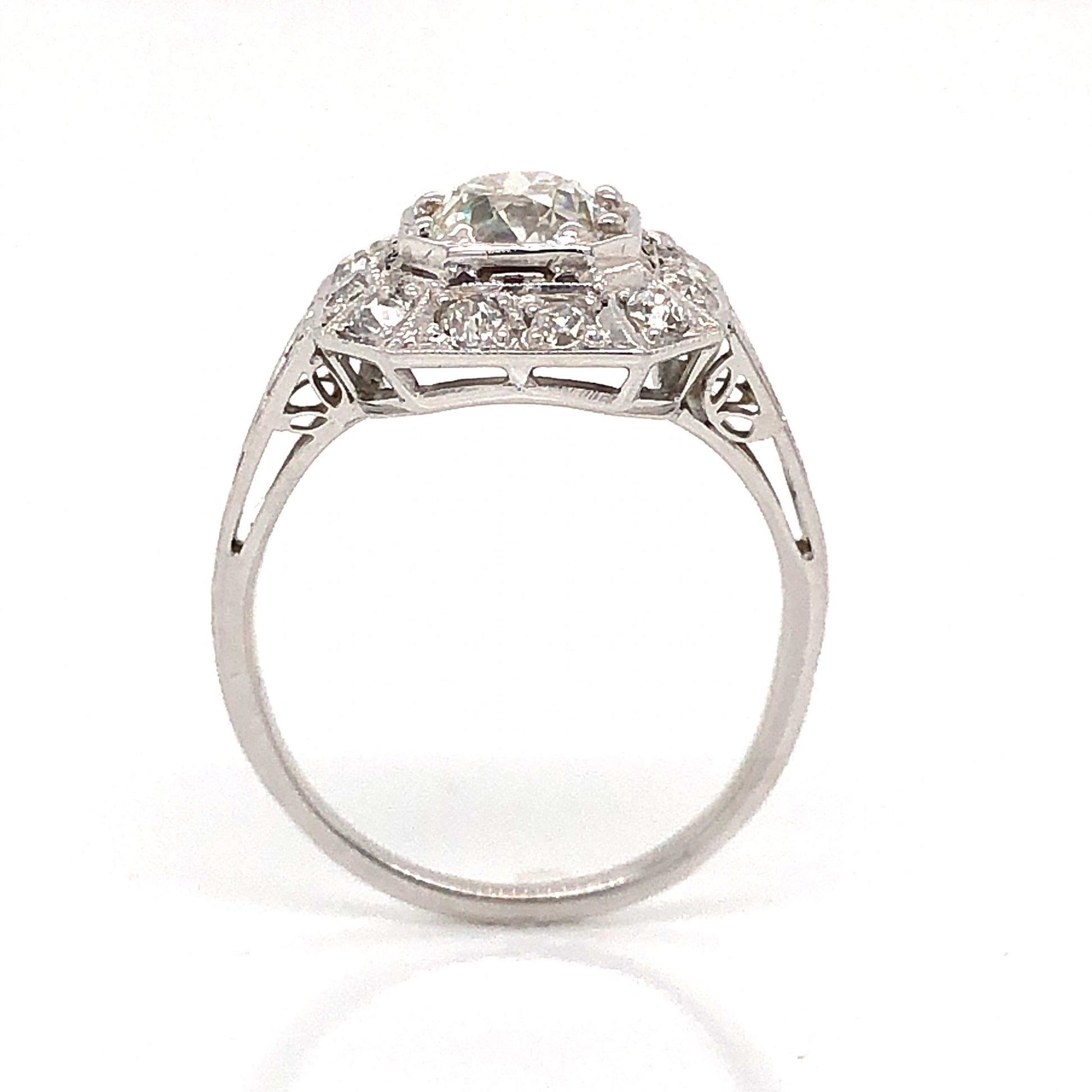 1.00 Carat Art Deco Diamond Engagement Ring in 18k White GoldComposition: Platinum Ring Size: 6 Total Diamond Weight: 1.36ct Total Gram Weight: 3.1 g