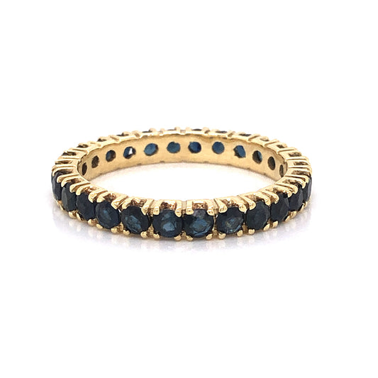 Round Sapphire Eternity Wedding Band in 14k Yellow Gold