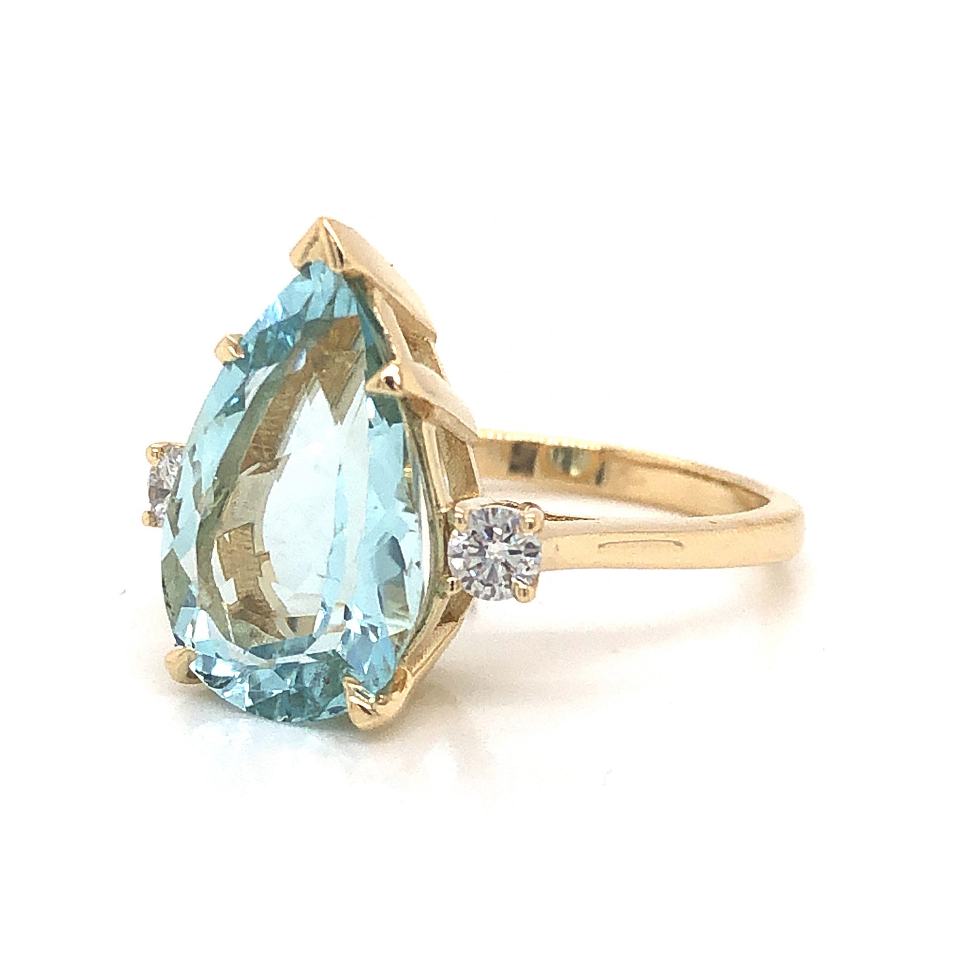 Pear Cut Aquamarine Engagement Ring in 14k Yellow GoldComposition: 14 Karat Yellow GoldRing Size: 6.75Total Diamond Weight: .18 ctTotal Gram Weight: 4.7 gInscription: 14K