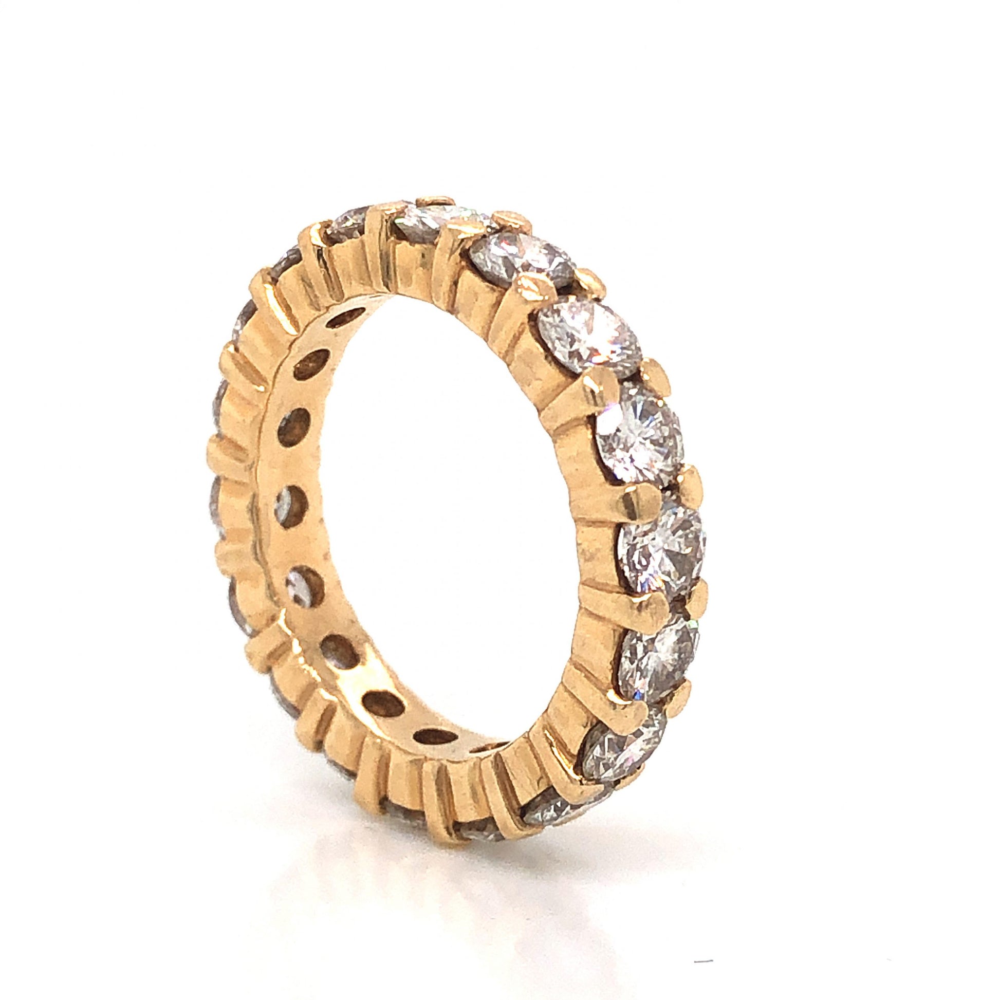 3.80 Diamond Eternity Band in 14k Yellow GoldComposition: 14 Karat Yellow Gold Ring Size: 6 Total Diamond Weight: 3.80ct Total Gram Weight: 5.4 g