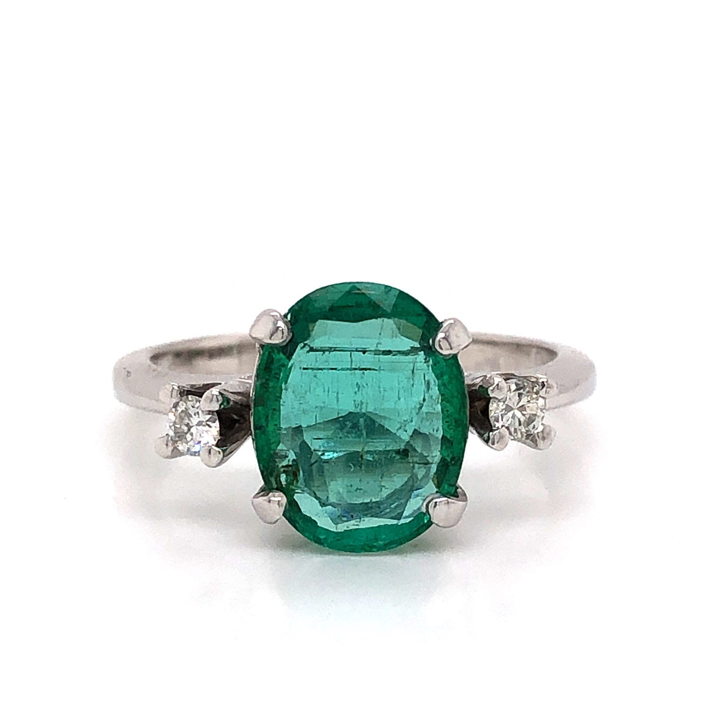 Modern Oval Cut Emerald Ring in 14k White Gold