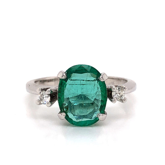 Modern Oval Cut Emerald Ring in 14k White Gold