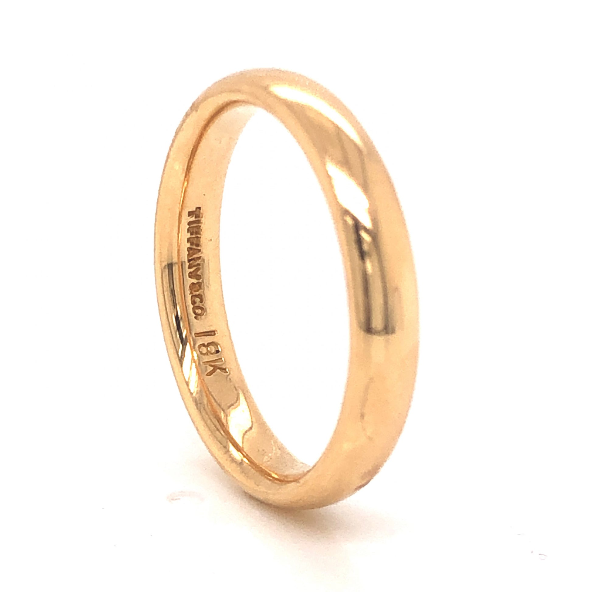 Tiffany & Co. Modern Wedding Band in 18k Yellow GoldComposition: 18 Karat Yellow GoldRing Size: 6.75Total Gram Weight: 4.8 gInscription: Tiffany & Co. 18k