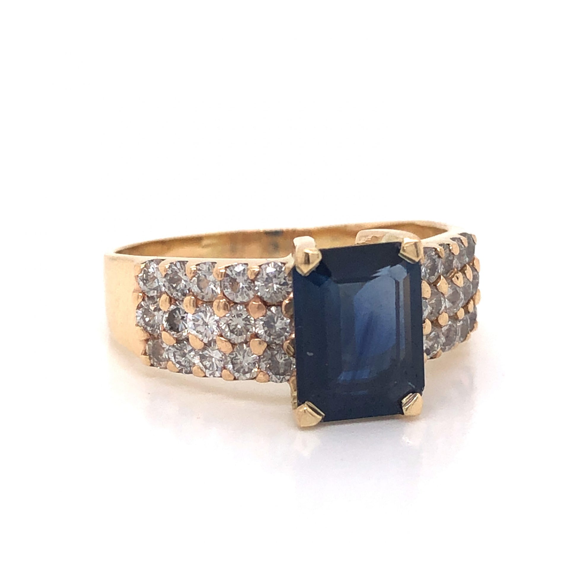 1.79 Emerald Cut Sapphire Engagement Ring in 14k Yellow GoldComposition: 14 Karat Yellow Gold Ring Size: 7 Total Diamond Weight: .90ct Total Gram Weight: 4.4 g Inscription: 14k ZM
      