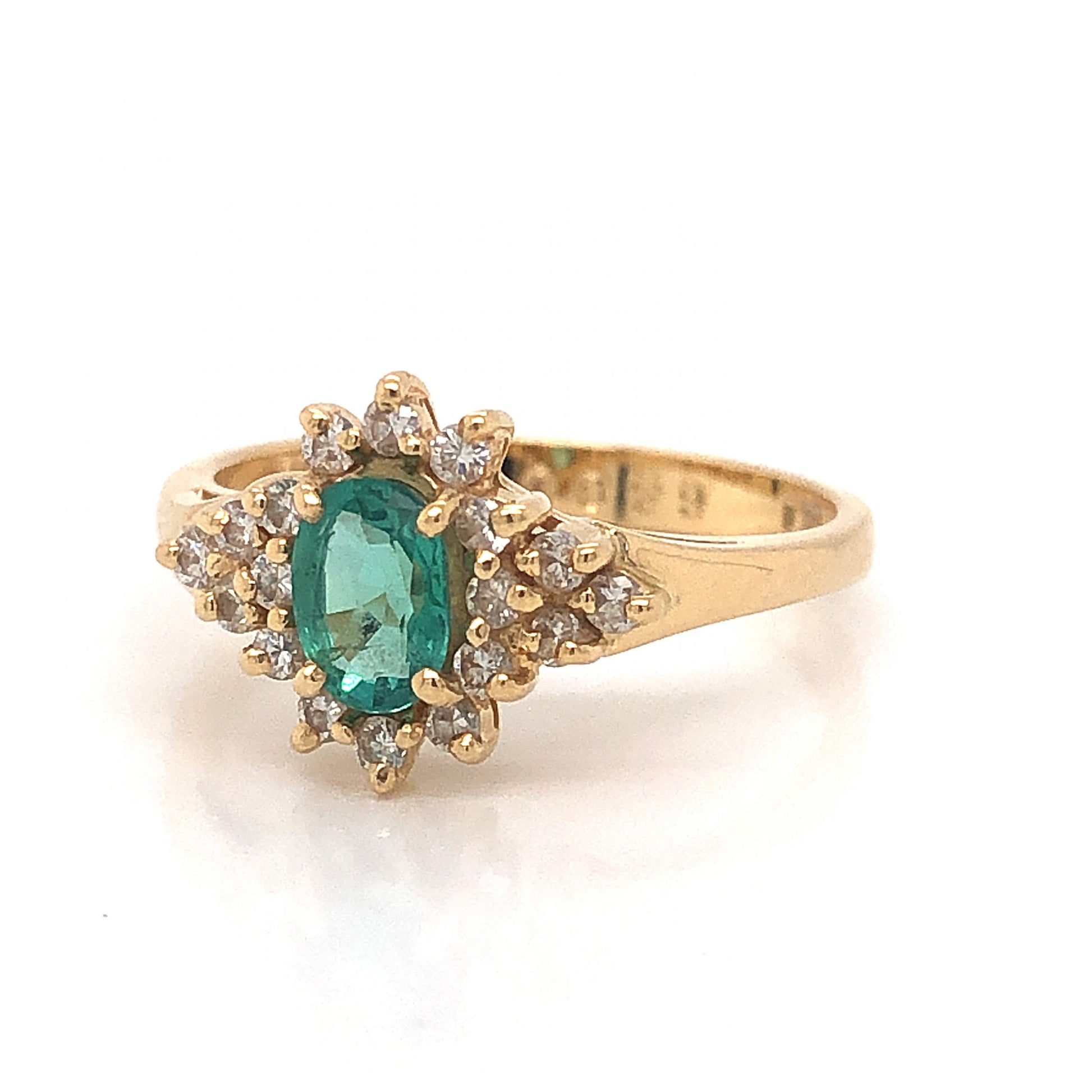 .30 Oval Cut Emerald & Diamond Ring in 14k Yellow GoldComposition: 14 Karat Yellow Gold Ring Size: 6.25 Total Diamond Weight: .18ct Total Gram Weight: 2.7 g Inscription: JAYLEN 6300 14KP
      