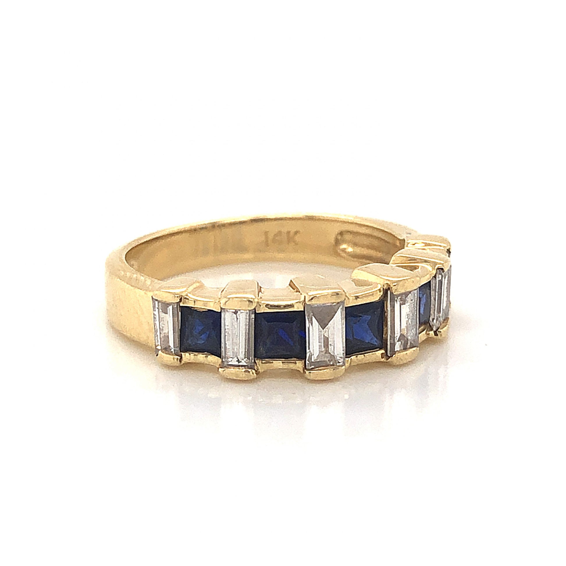 Sapphire & Baguette Diamond Wedding Band in 14k Yellow GoldComposition: 14 Karat Yellow Gold Ring Size: 5.75 Total Diamond Weight: .84ct Total Gram Weight: 3.8 g Inscription: 14k
      